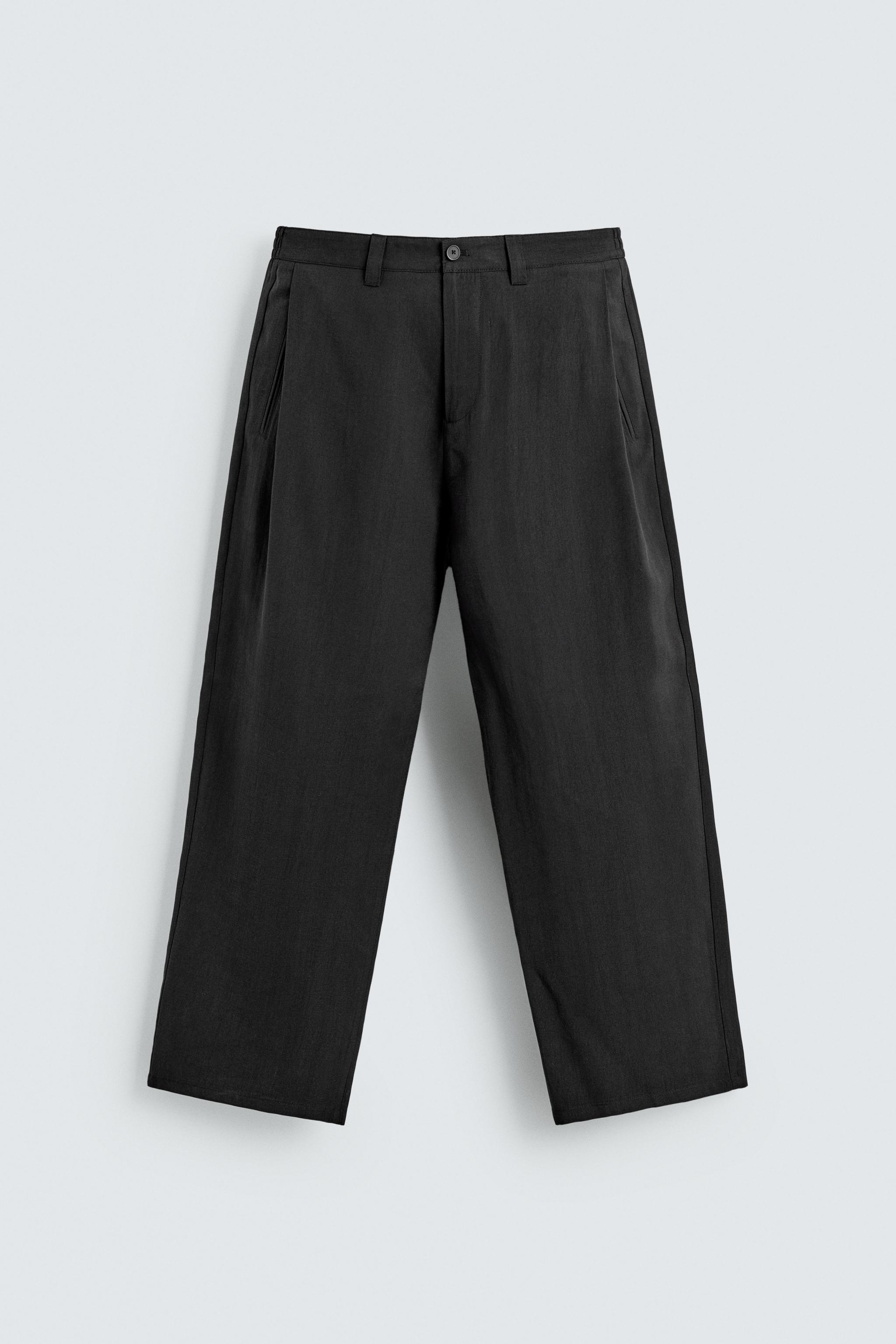FLOWY PLEATED PANTS