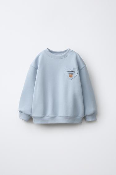 SUDADERA BOLSILLO CORAZÓN - Celeste de Zara - Imagen 0
