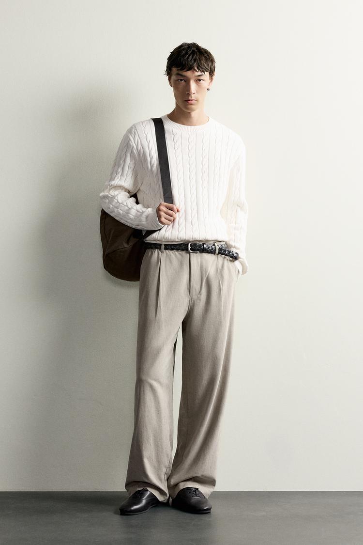 RELAXED FIT PLEATED TROUSERS