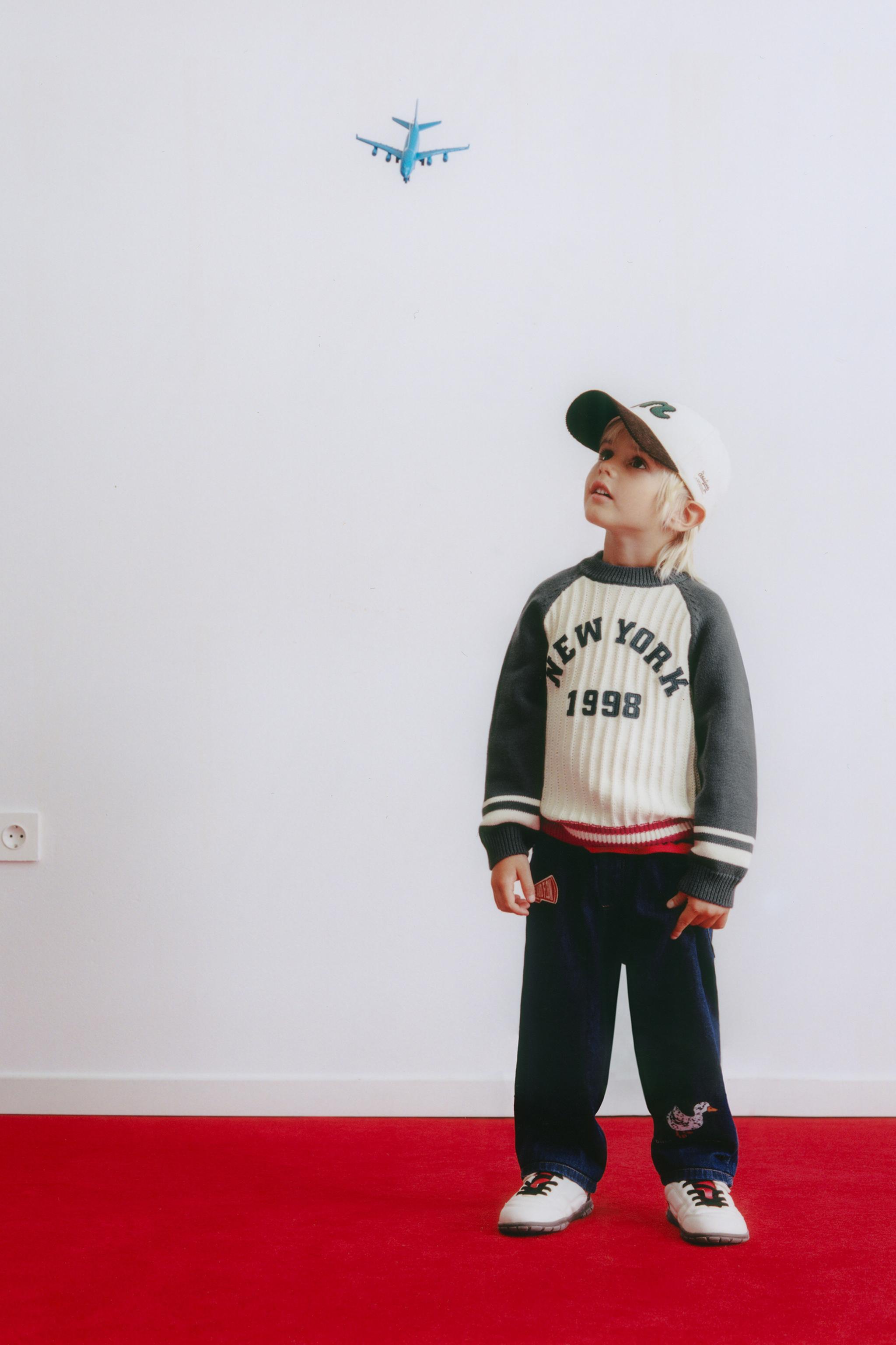 TEXTURED KNIT TEXT JUMPER