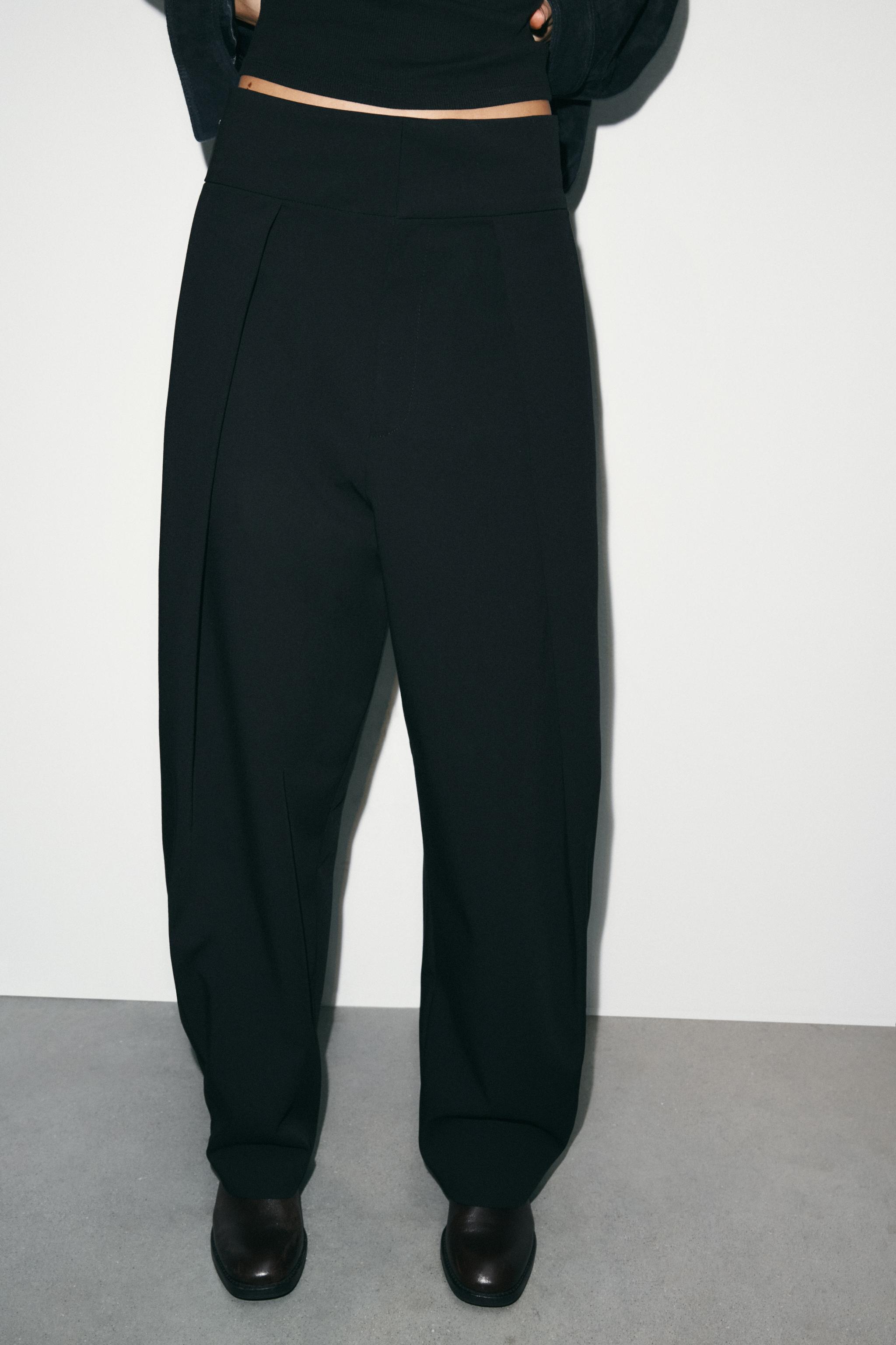 STRIPED PLEATED BALLOON PANTS