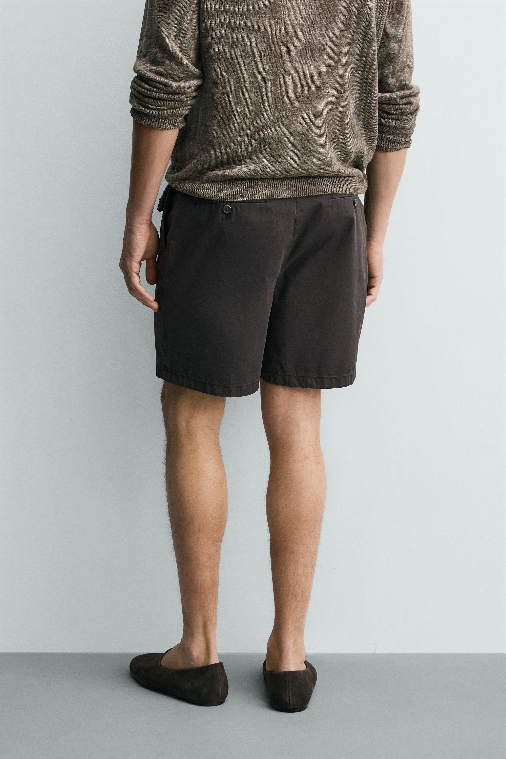 REGULAR FIT PLEATED SHORTS