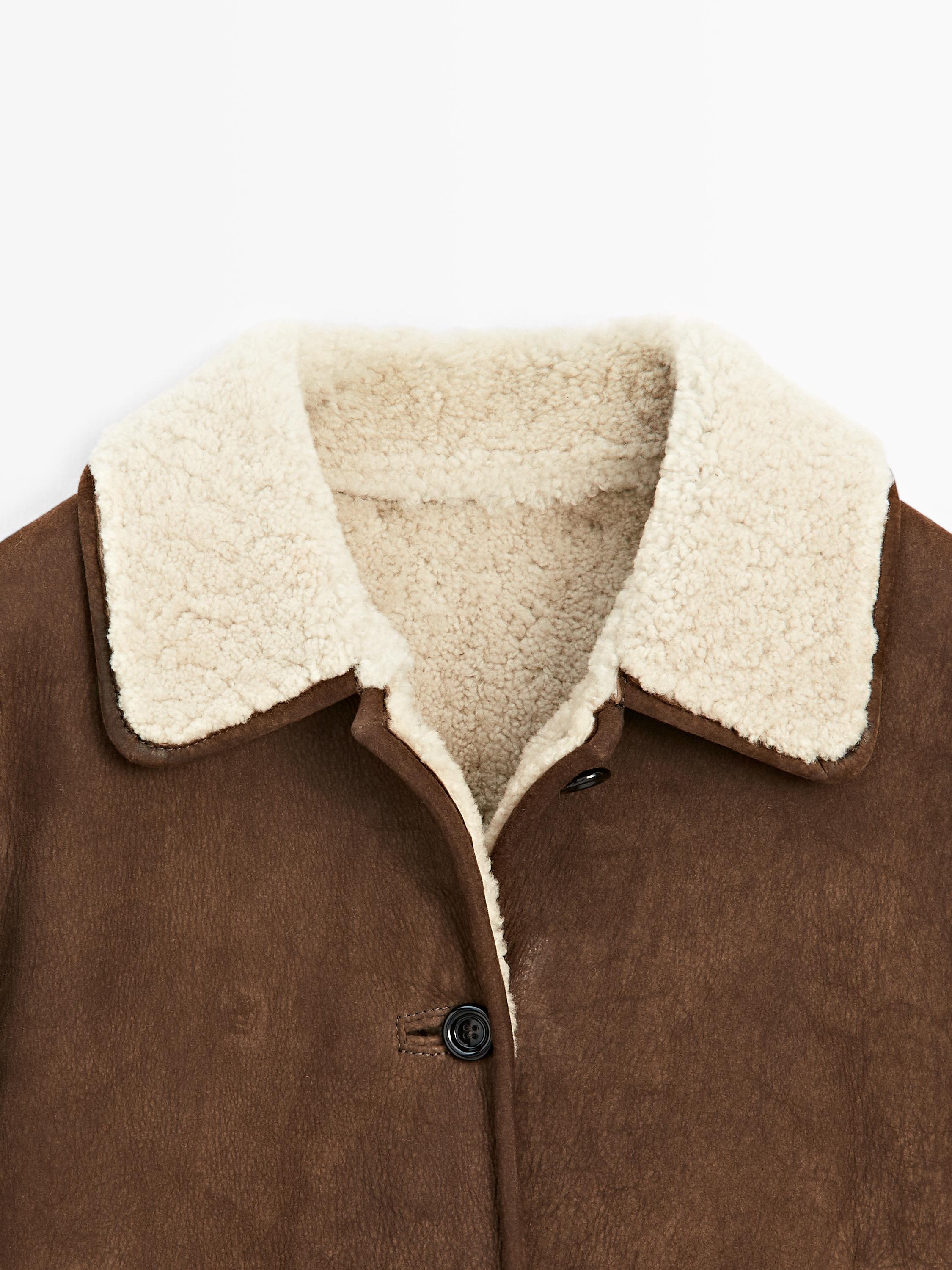Veste courte en cuir avec mouton synthétique