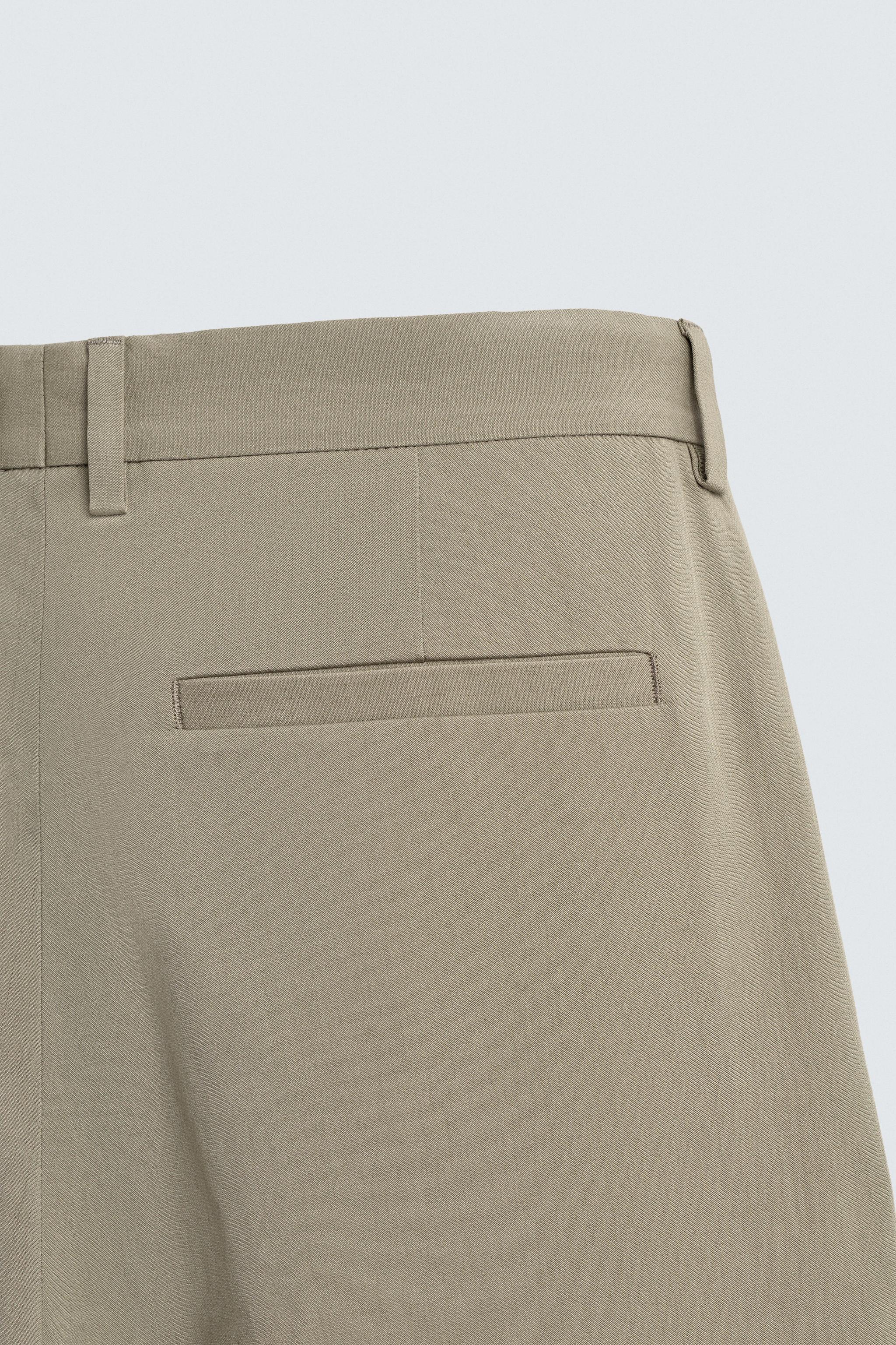 PLEATED STRAIGHT FIT PANTS