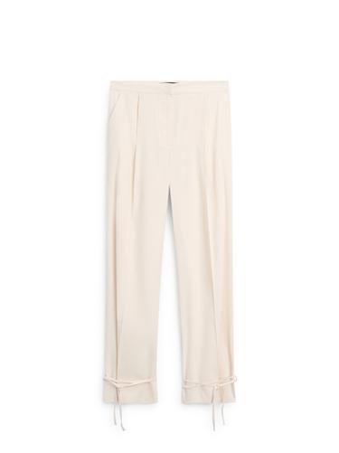 Pantalón fluido barrel fit - Crudo de Zara