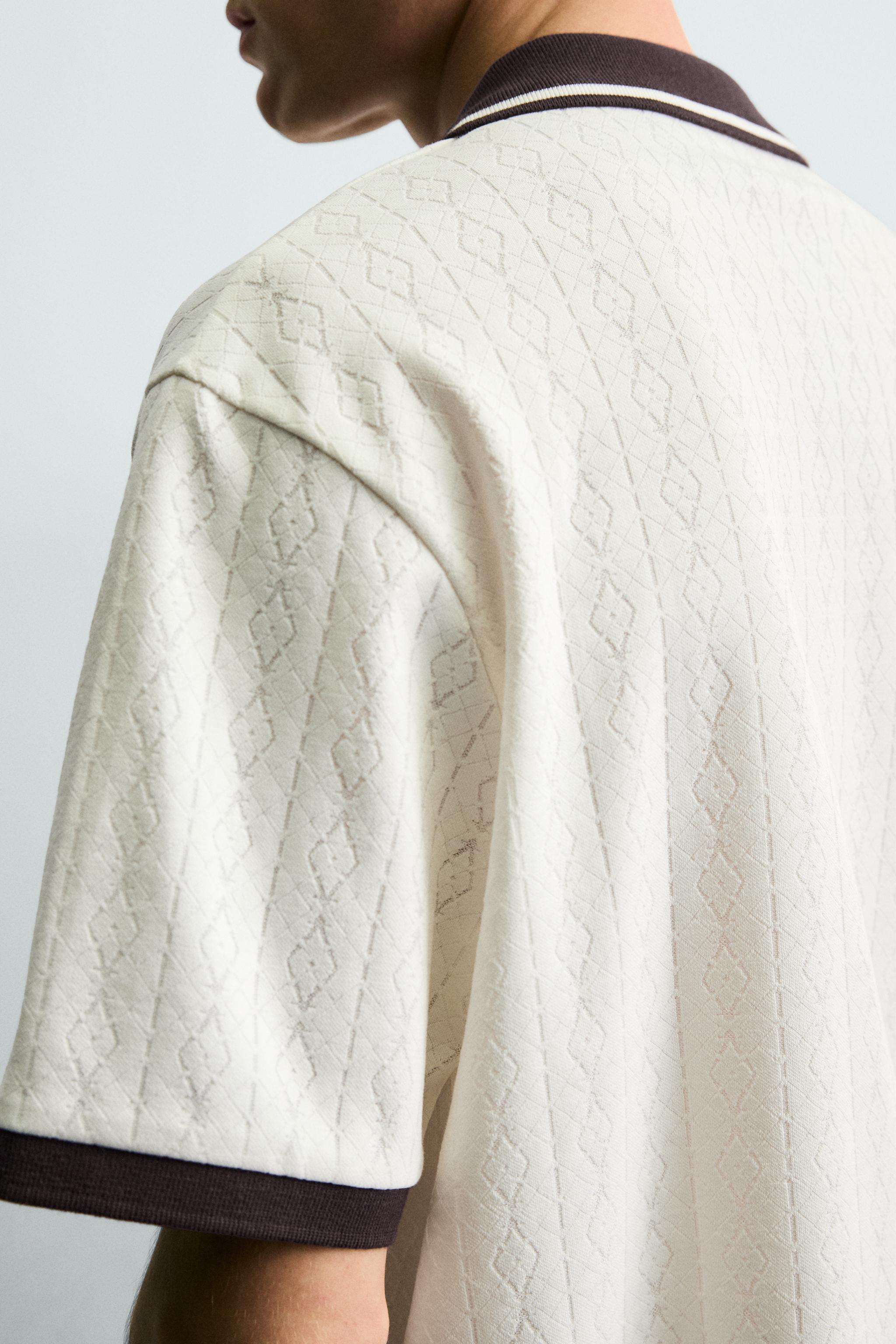 POLO JACQUARD VERTICAL BRODÉ