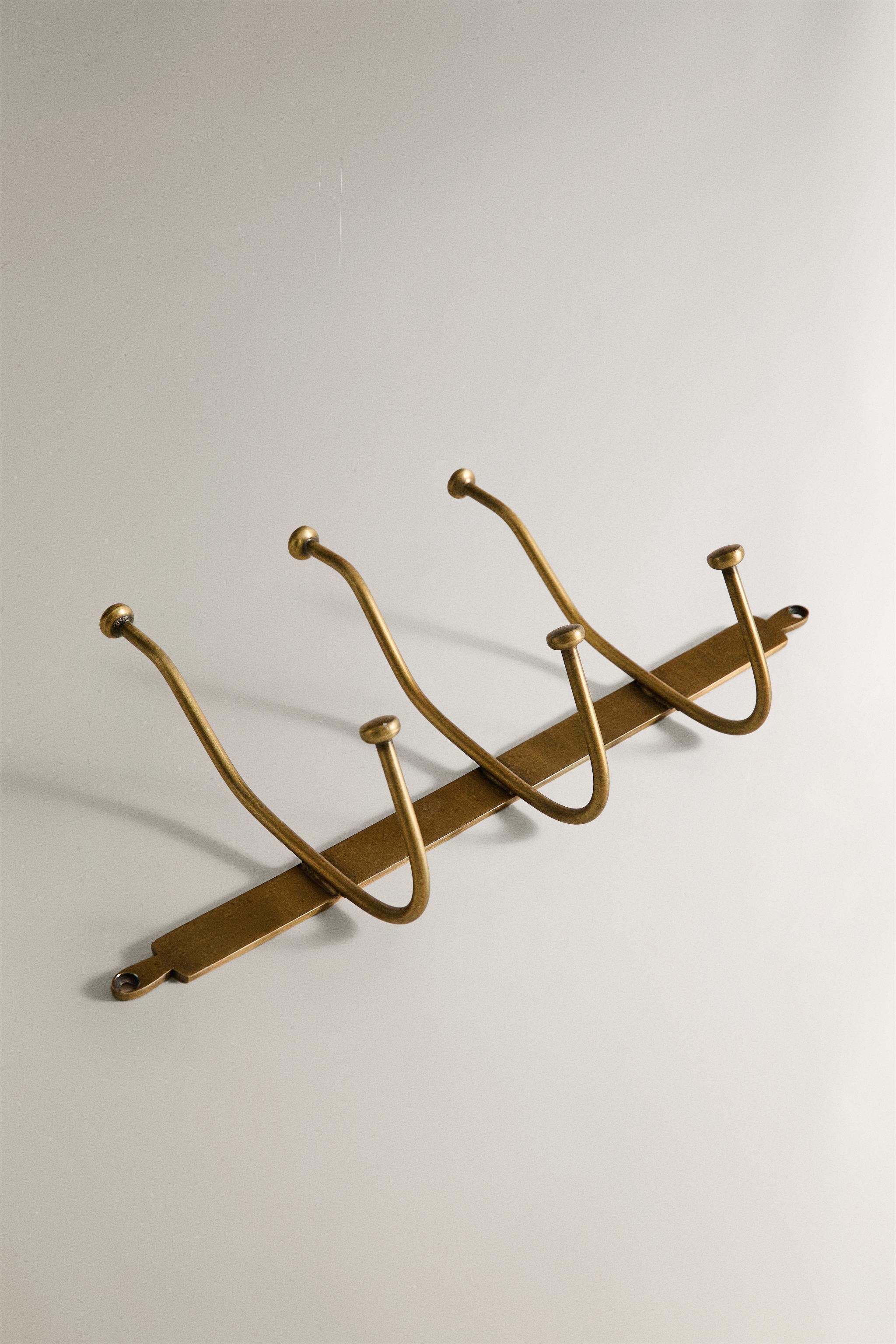 GOLD WALL RACK — Golden