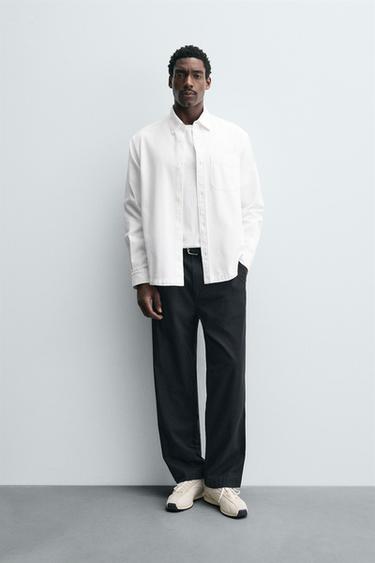 RELAXED FIT PLEATED TROUSERS - Navy blue by Zara
