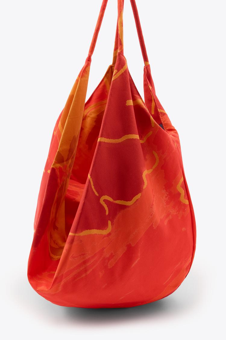 MAXI-TASKE MED BLOMSTERPRINT I BOMULD