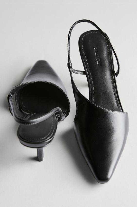 Asymmetric high-heel shoes from Zara - $200
