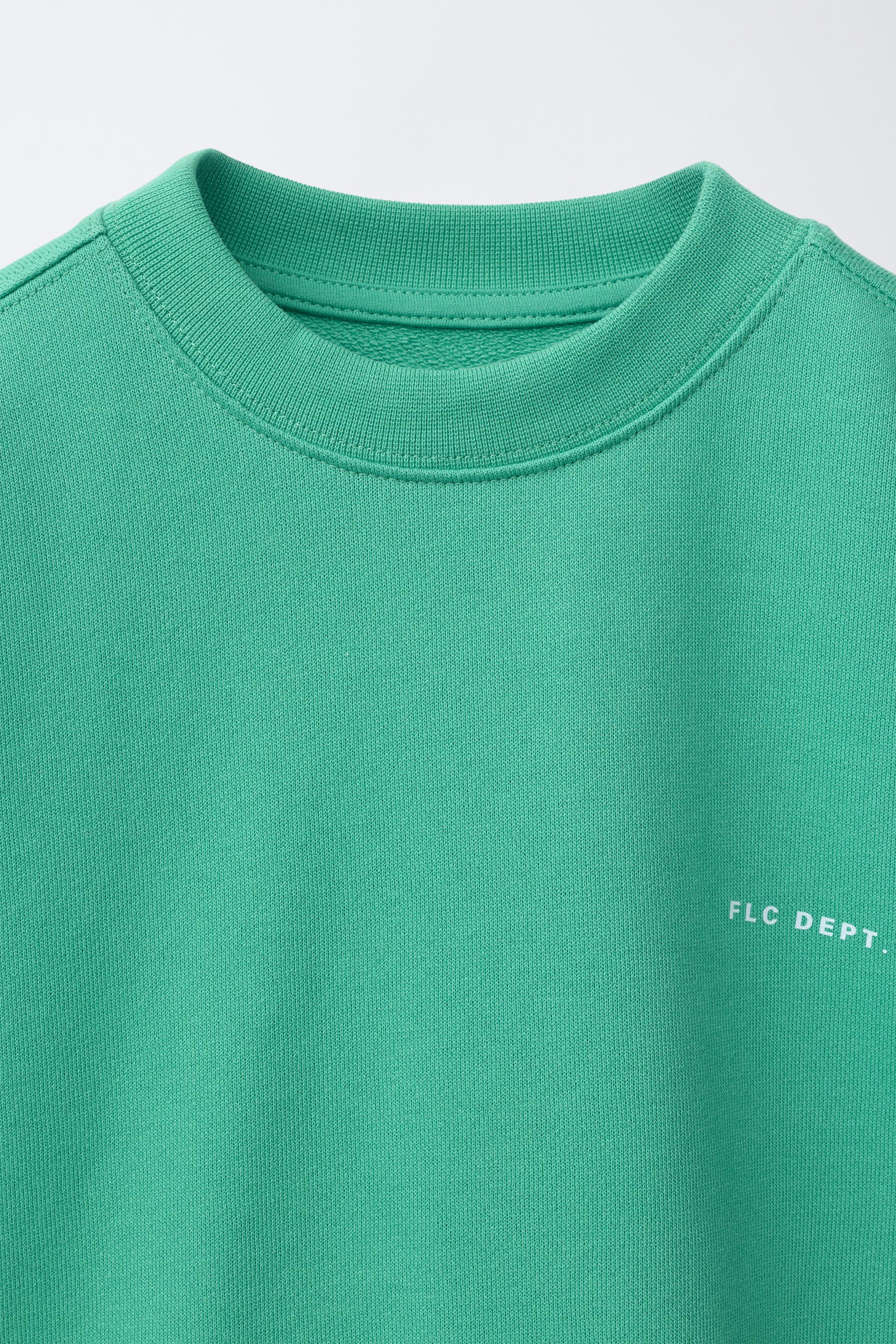 SHORT SLEEVE TEXT SWEATSHIRT