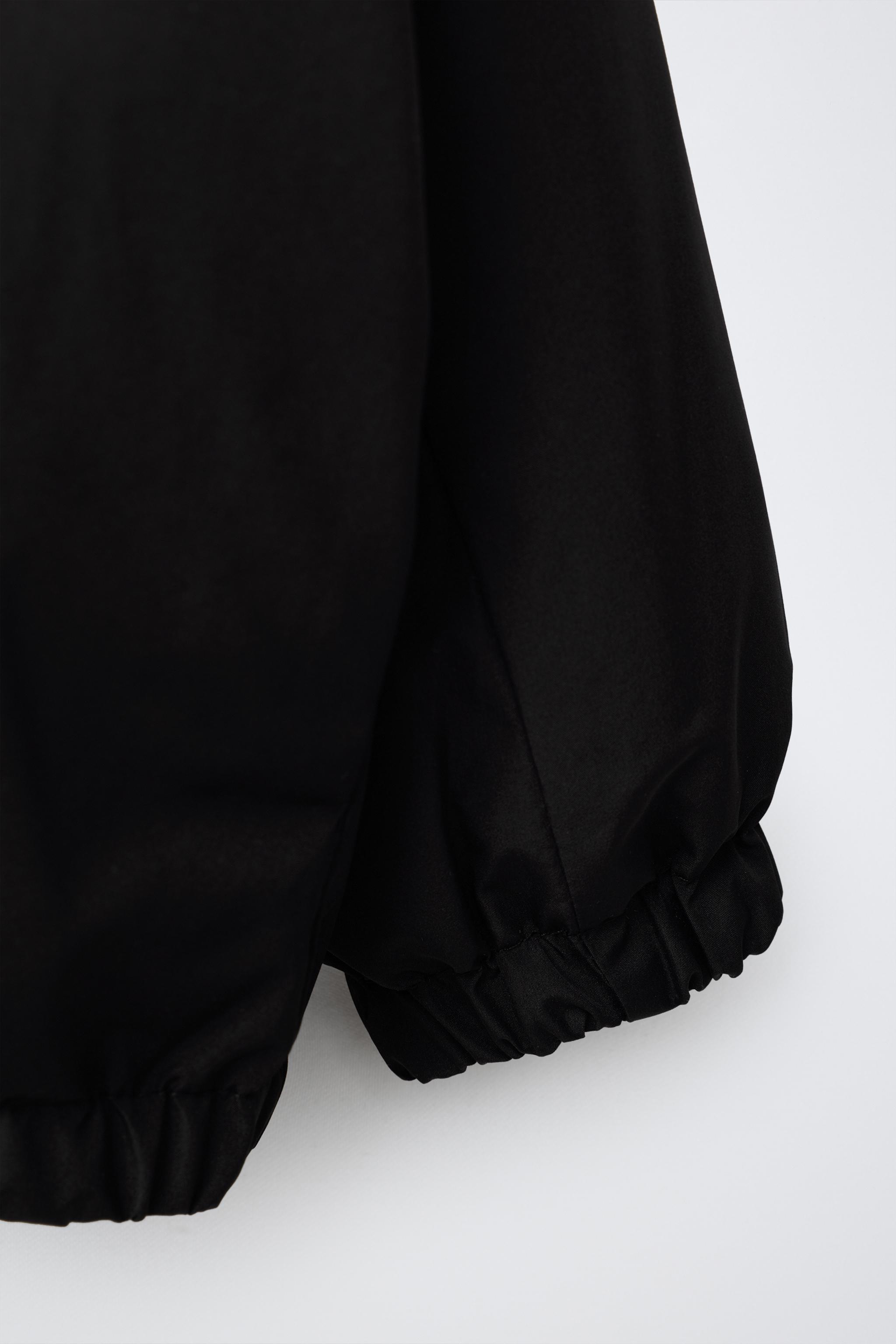 WATER REPELLENT TECHNICAL RAINCOAT