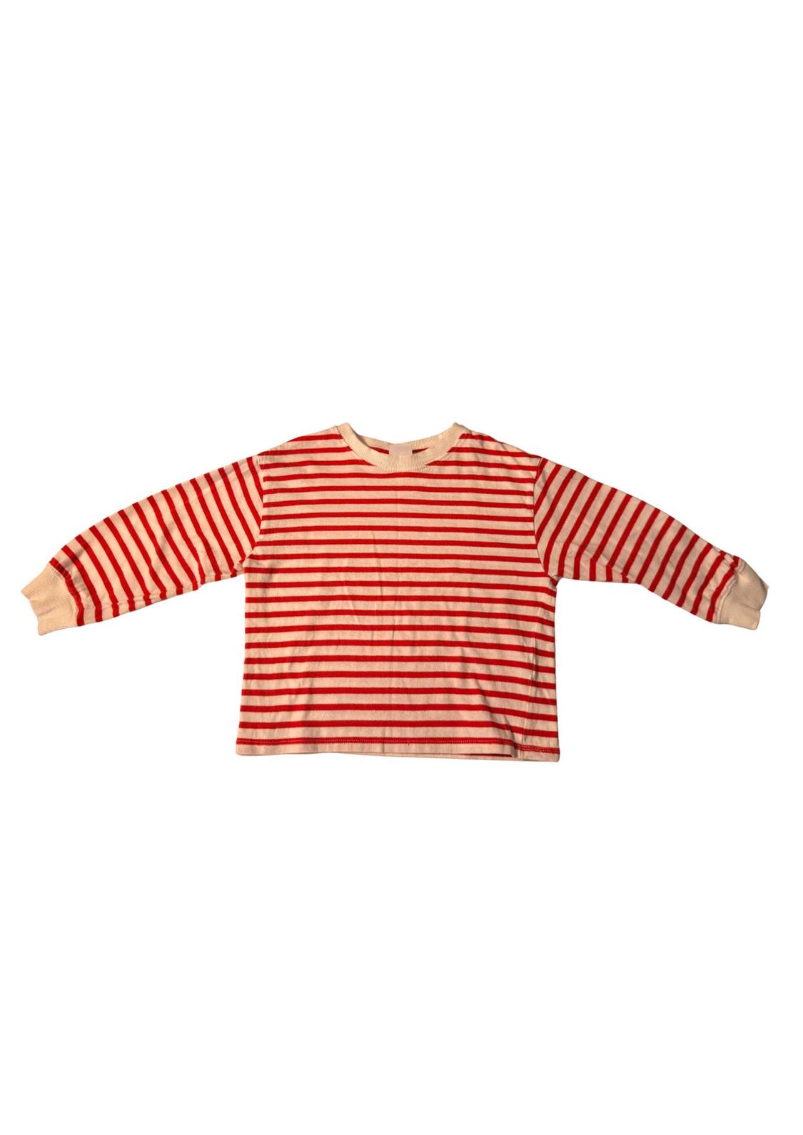 Red and white horizontal striped jumper with a round neck and long sleeves, on a white background.