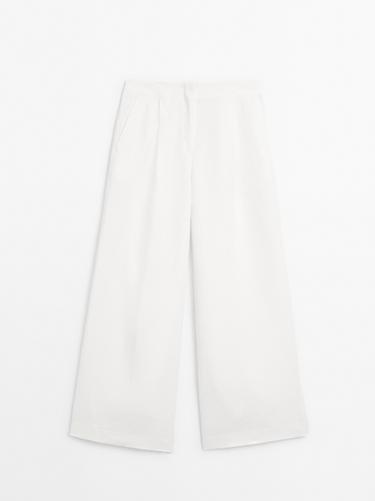 Pantalón traje pinzas lino - Crudo de Zara
