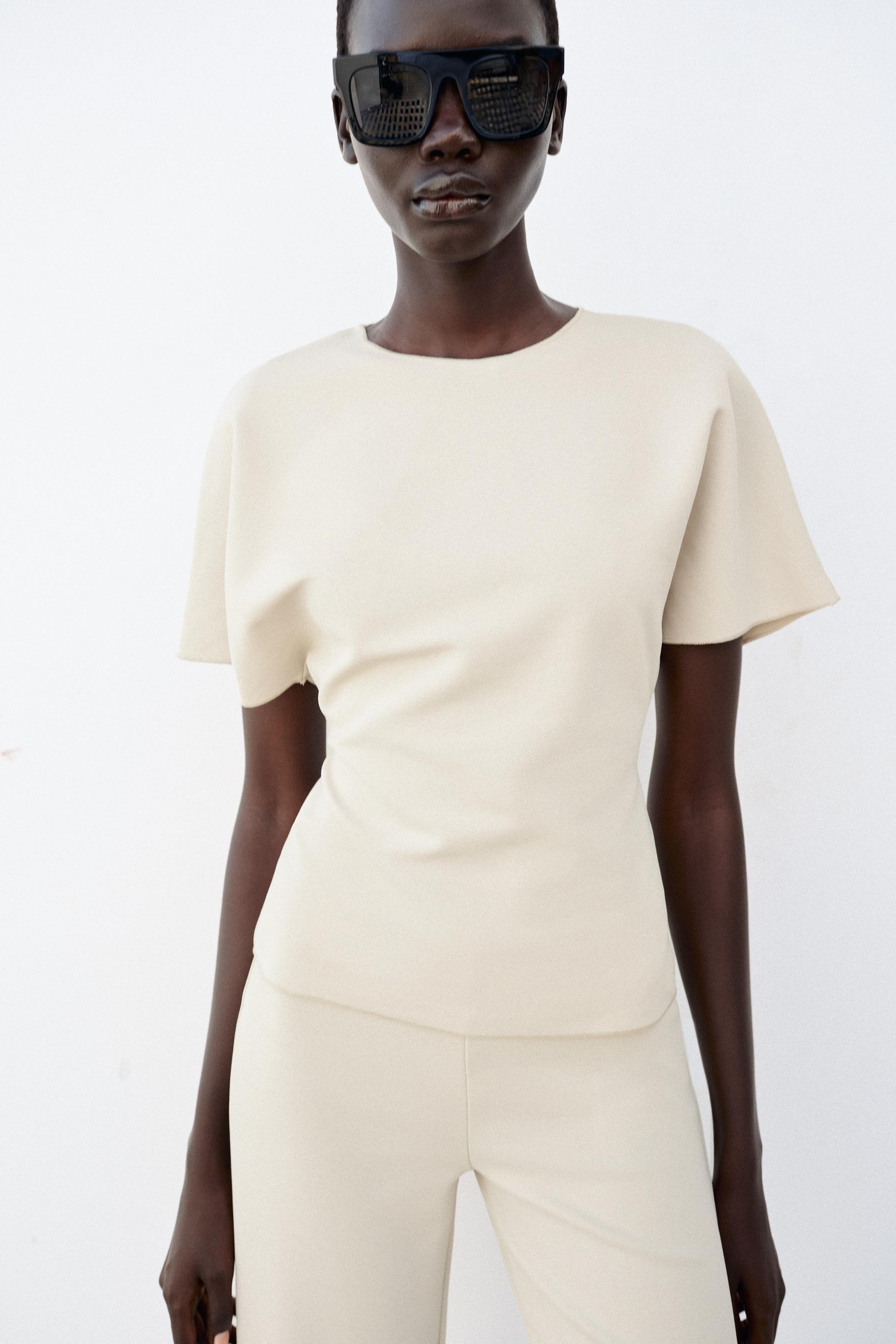 SHORT SLEEVE CUT OUT TOP — Ecru