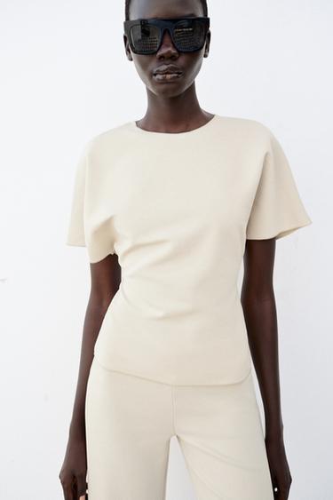 TOP CUT OUT MANGA CORTA - Crudo de Zara