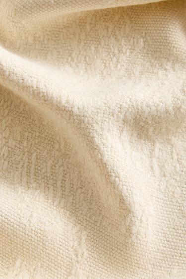 DEKEN MET JACQUARD BLOEMEN - Ecru van Zara