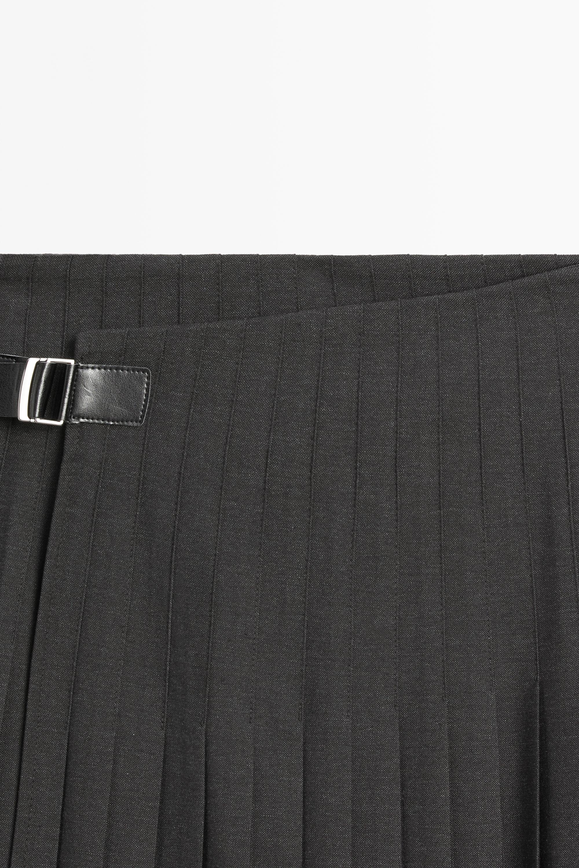 Jupe midi plissée applique
