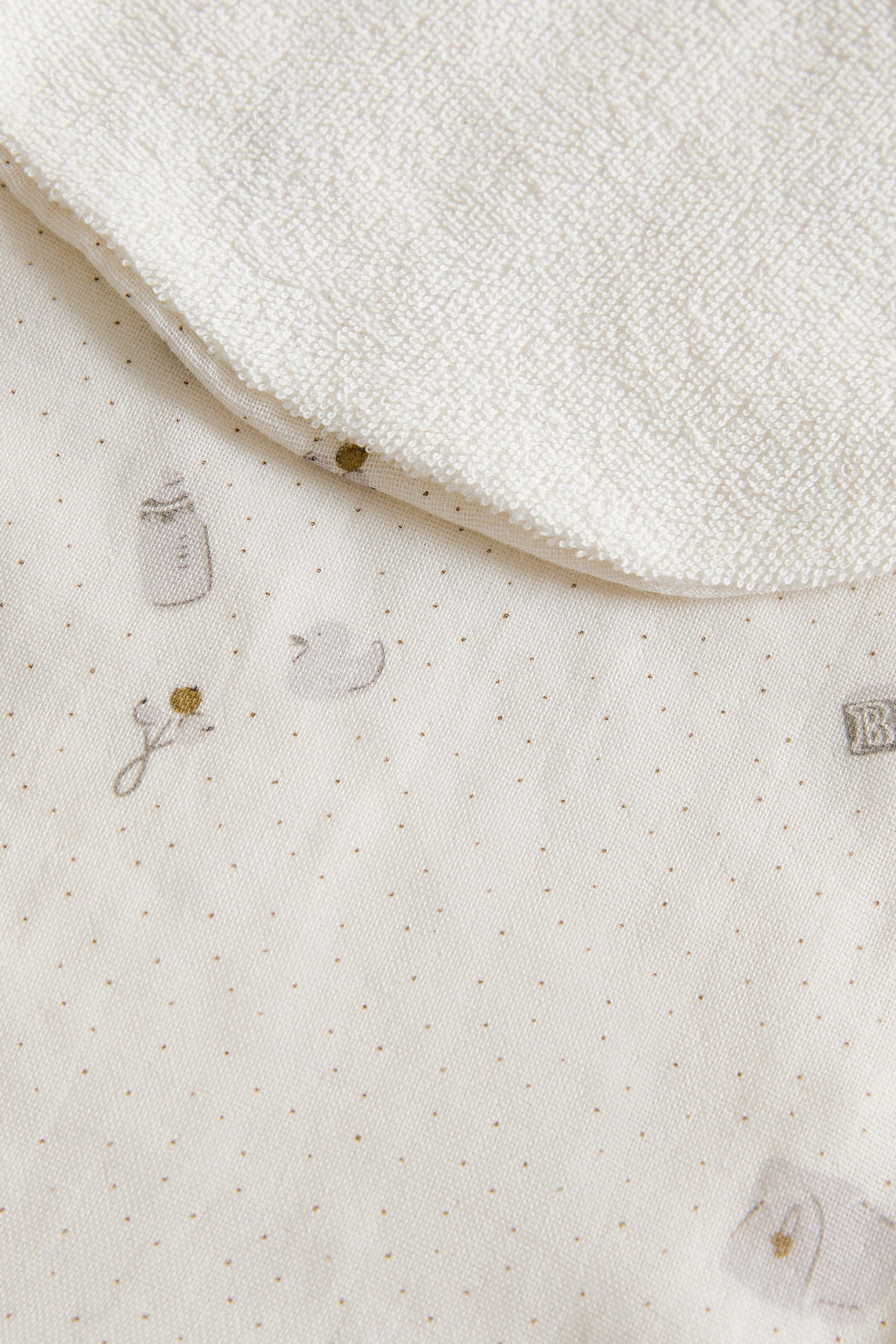 BAVOIR BÉBÉ ÉPAULE