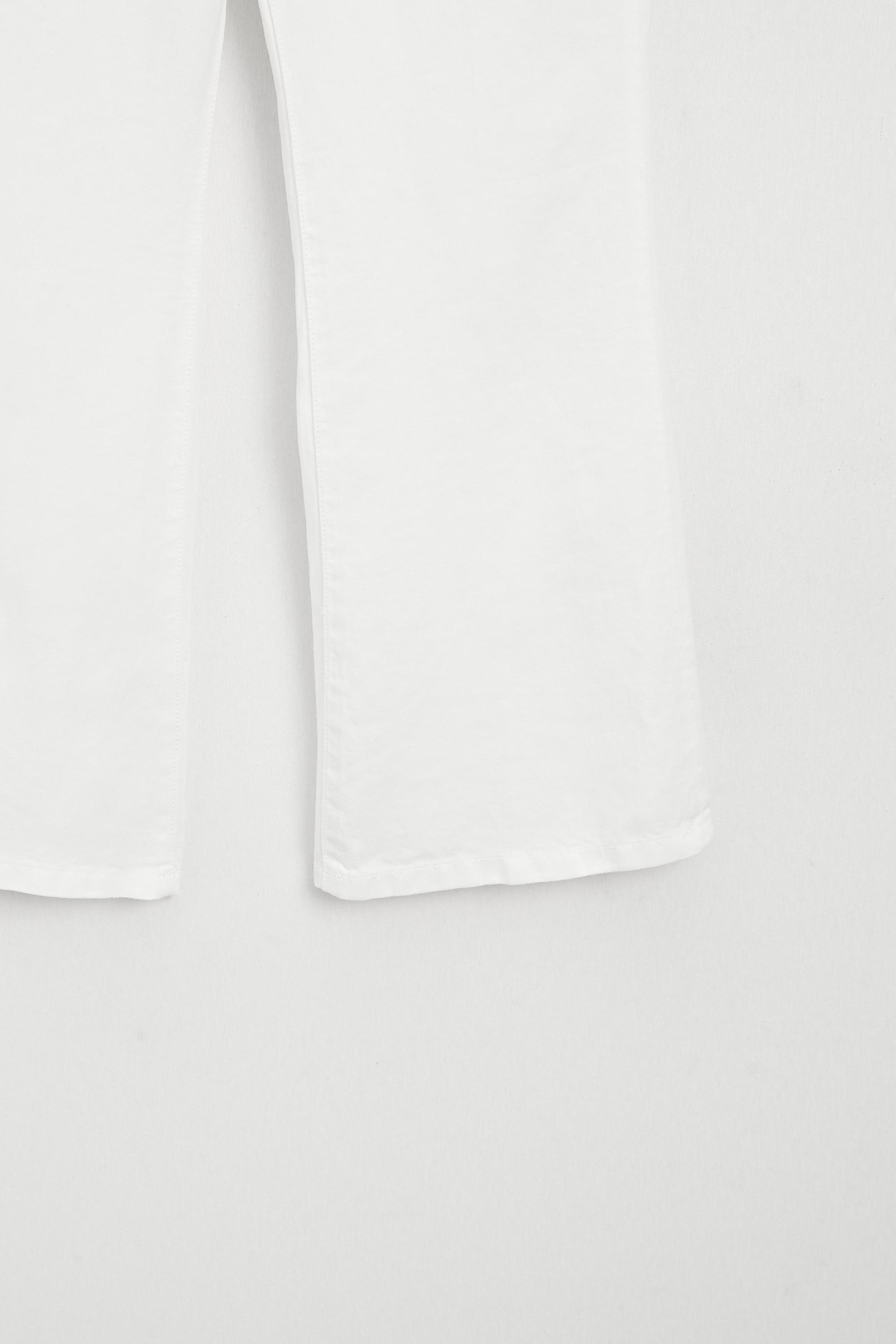 Pantalon flare cropped 100 % lin