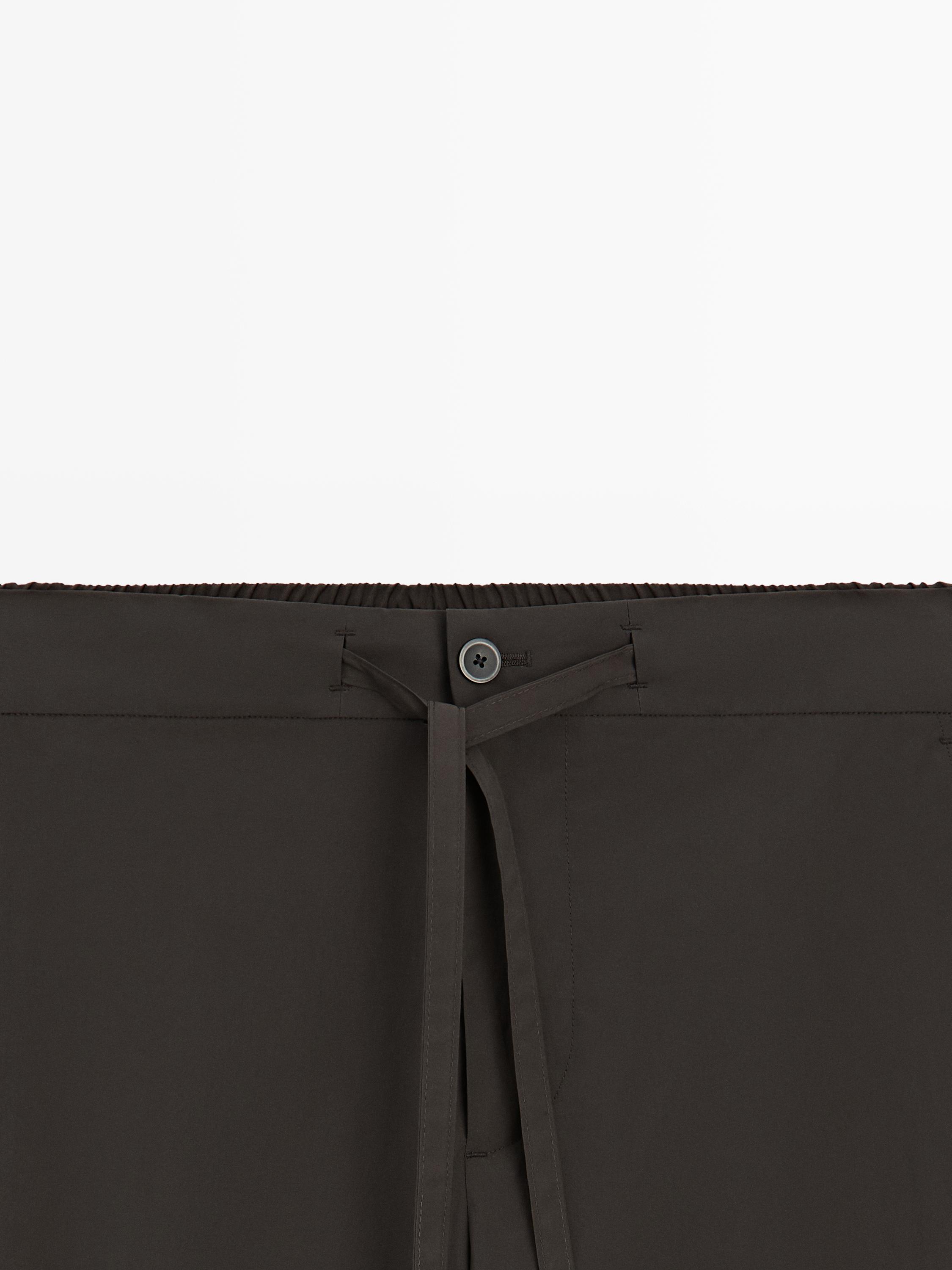 Total look technical trousers