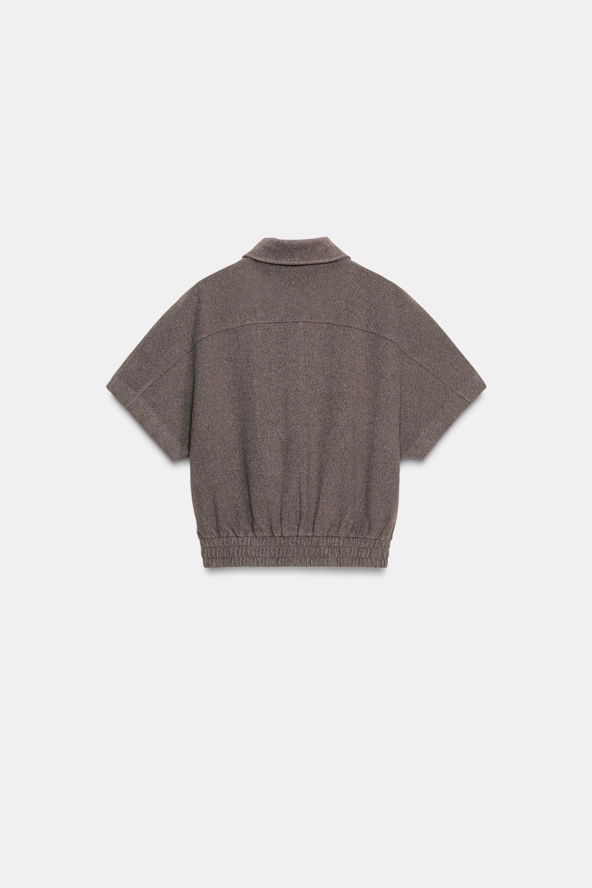 VESTE SOUPLE À MANCHES COURTES