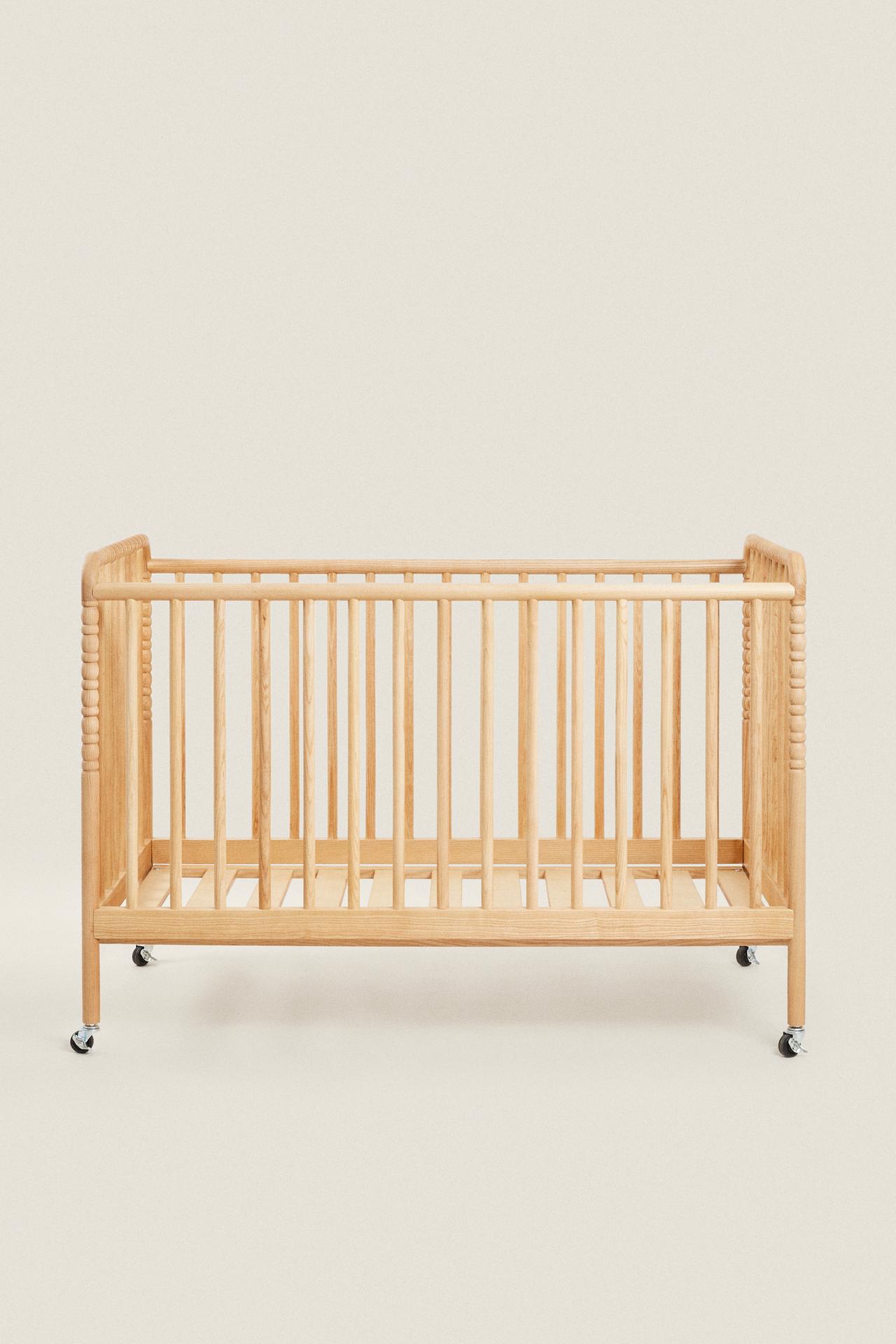 CARVED WOODEN COT WITH WHEELS — Light beige