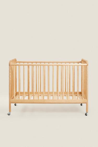 CARVED WOODEN COT WITH WHEELS — Light beige 2