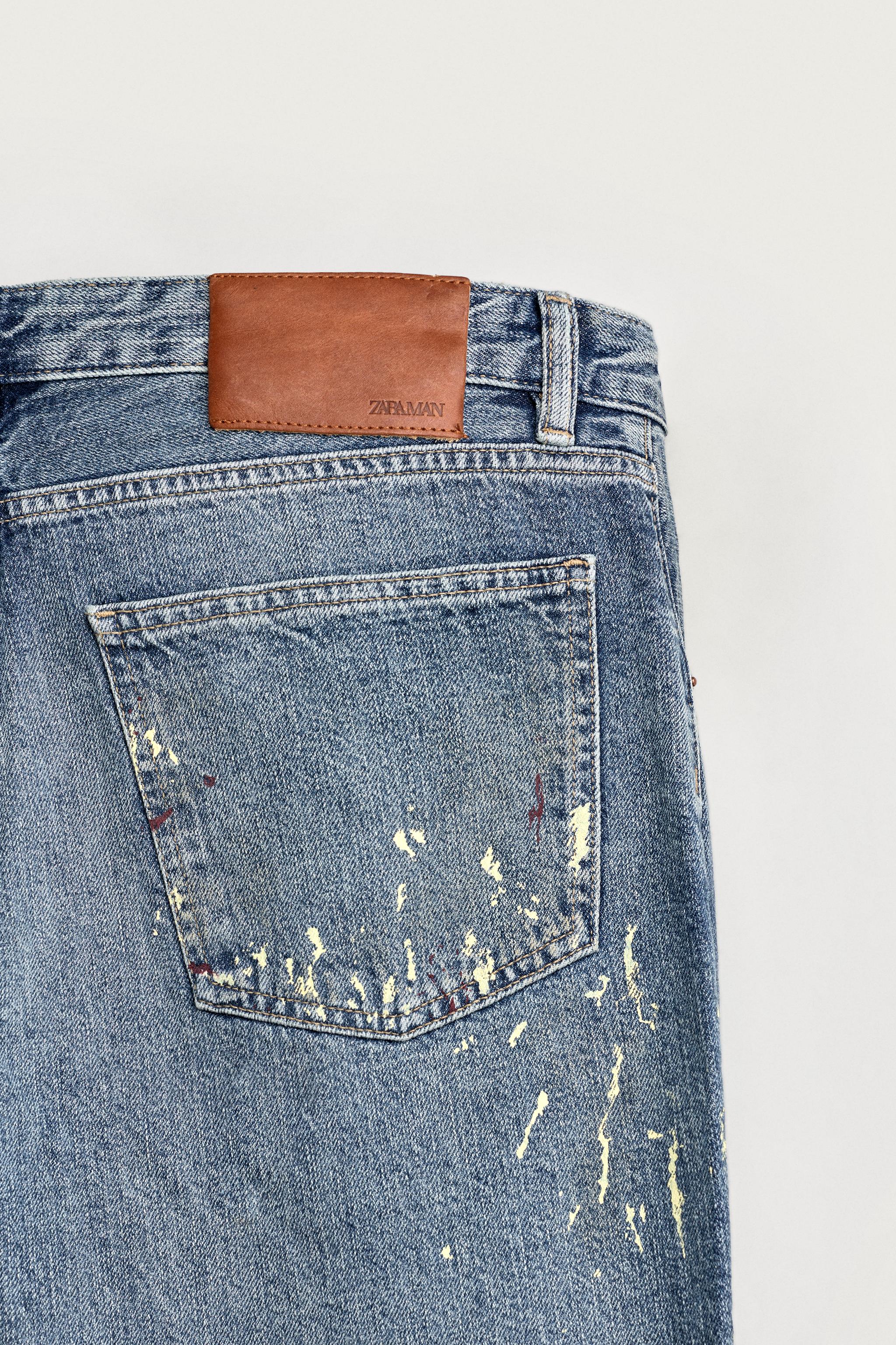 SPLATTER PRINT FLARE FIT JEANS