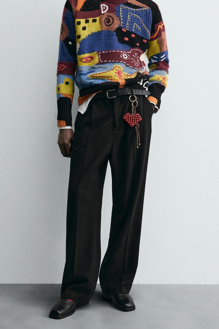 RELAXED FIT PLEATED TROUSERS