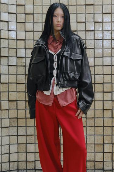 ストラップ付きフェイクレザージャケットブラックZaraのストラップ付きフェイクレザージャケット - ブラック 