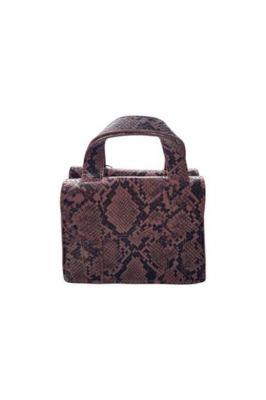 Front view of a small bag with a snake print and short handles.