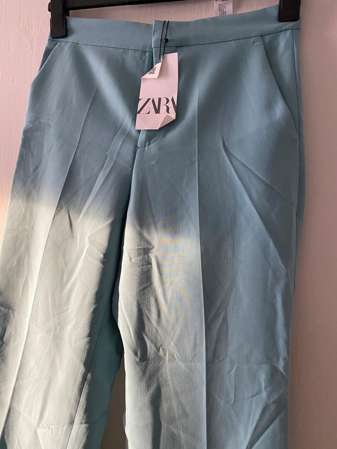 FLARED TROUSERS
