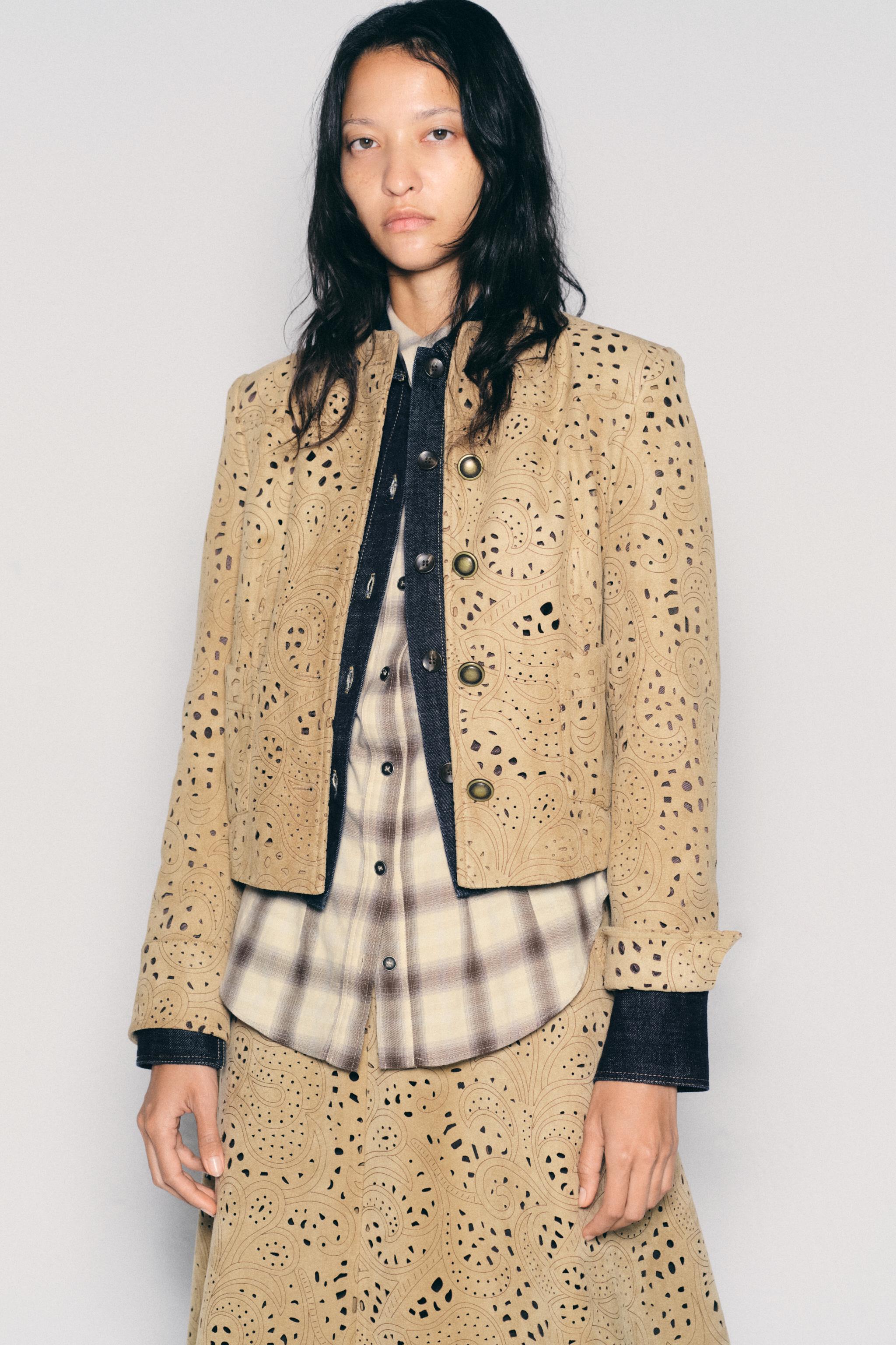 VESTE EFFET DAIM TROQUELÉE