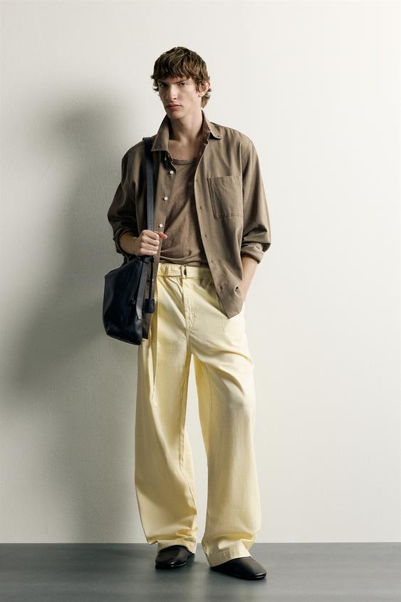 RELAXED FIT PLEATED TROUSERS WITH BELT - Light yellow by Zara - Image 0