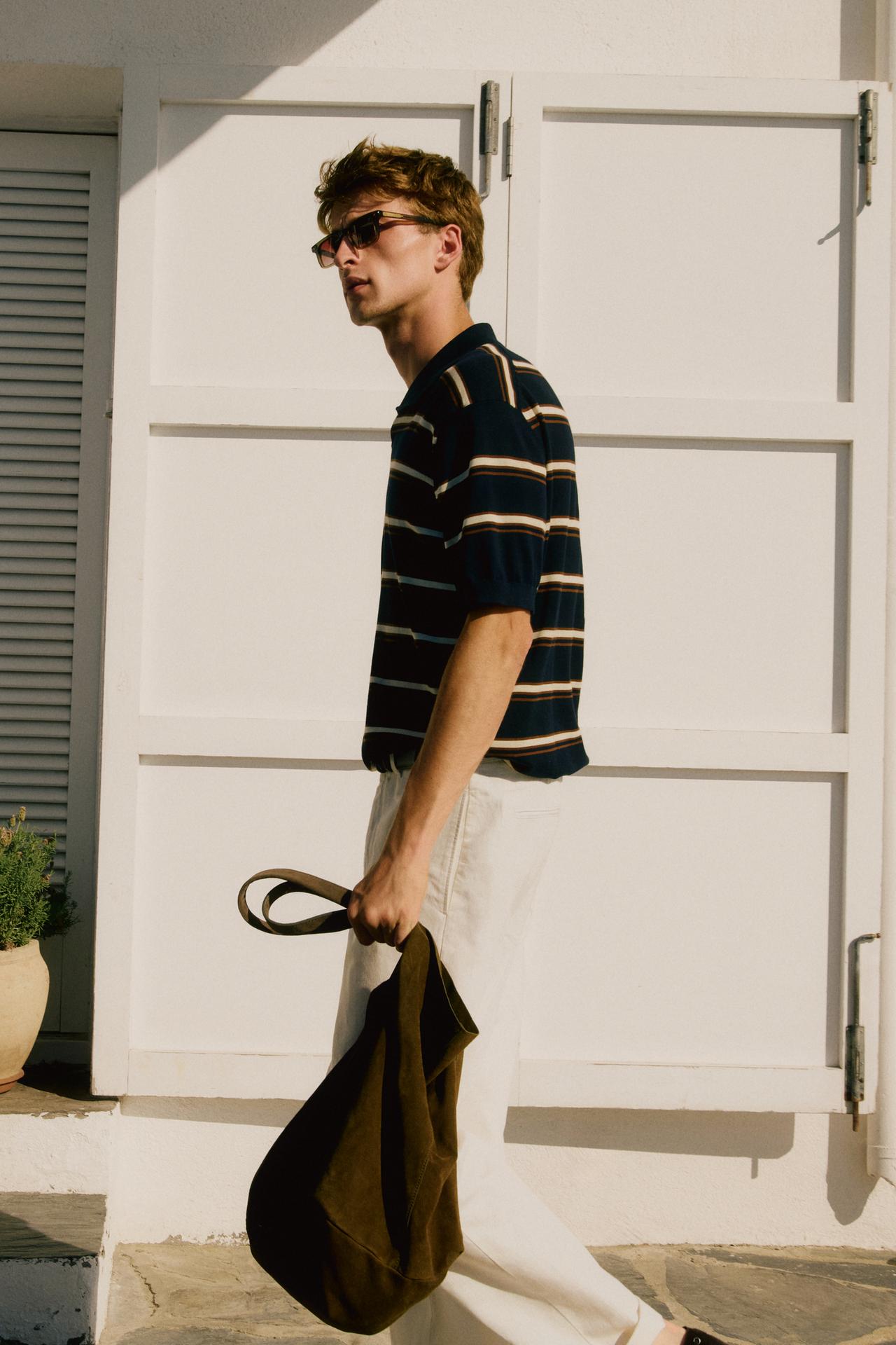 Striped V-neck knit polo shirt — Navy blue