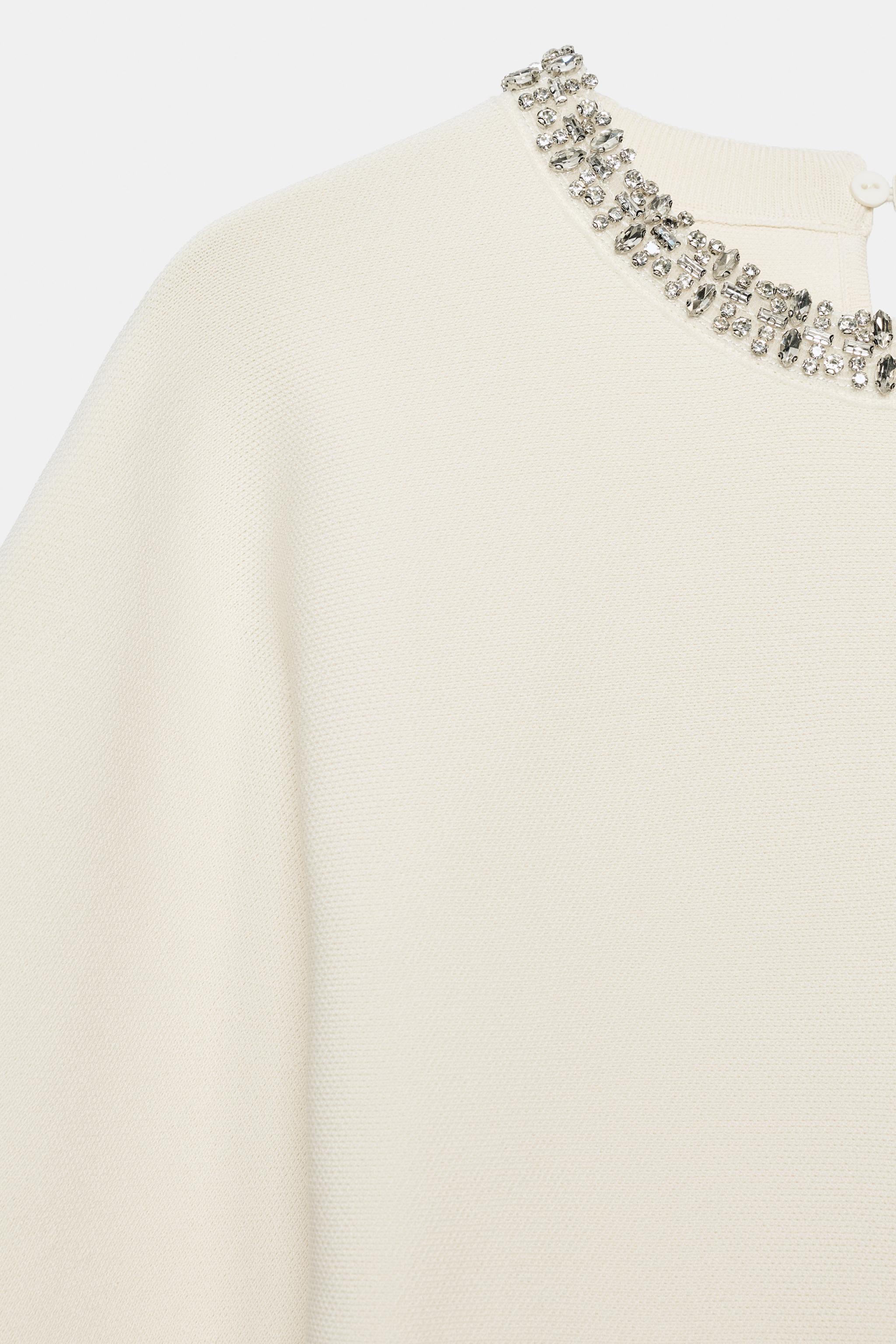 TOP EN MAILLE À COL BIJOU