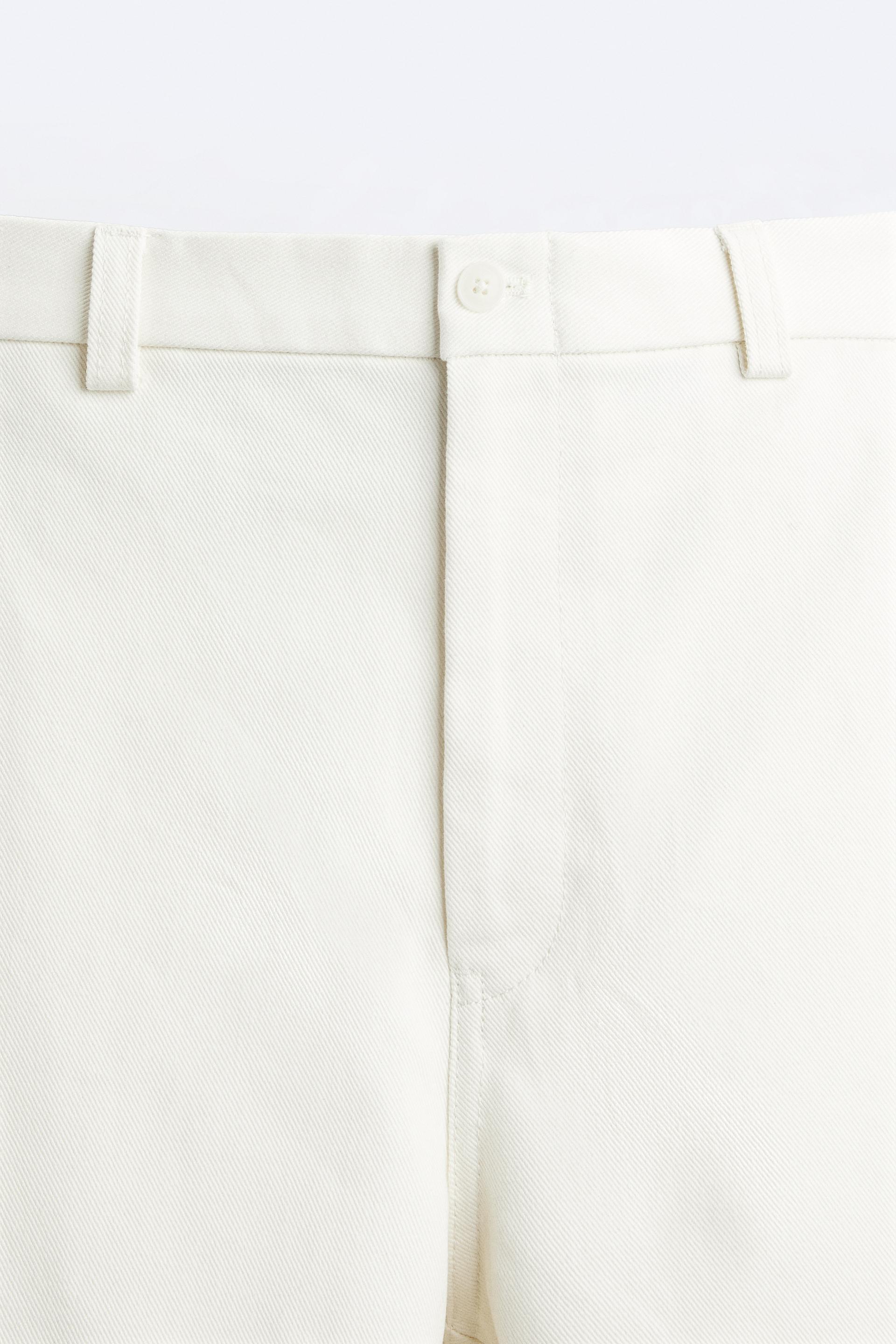 Pantalons ZARA Femme  Pantalon Droit Fendu Blanc Cassé < Arpanet APP