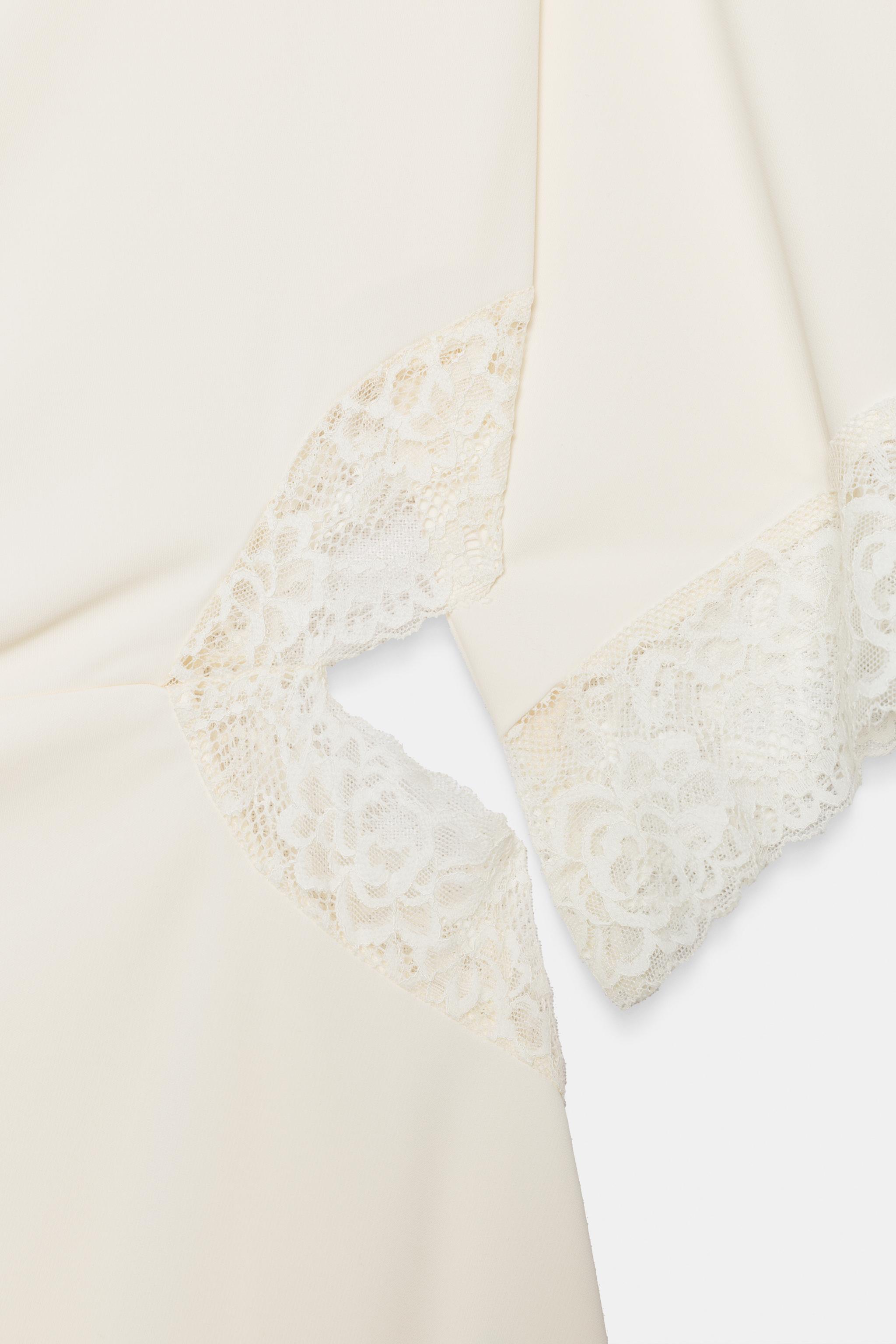 ROBE ASYMÉTRIQUE EN DENTELLE