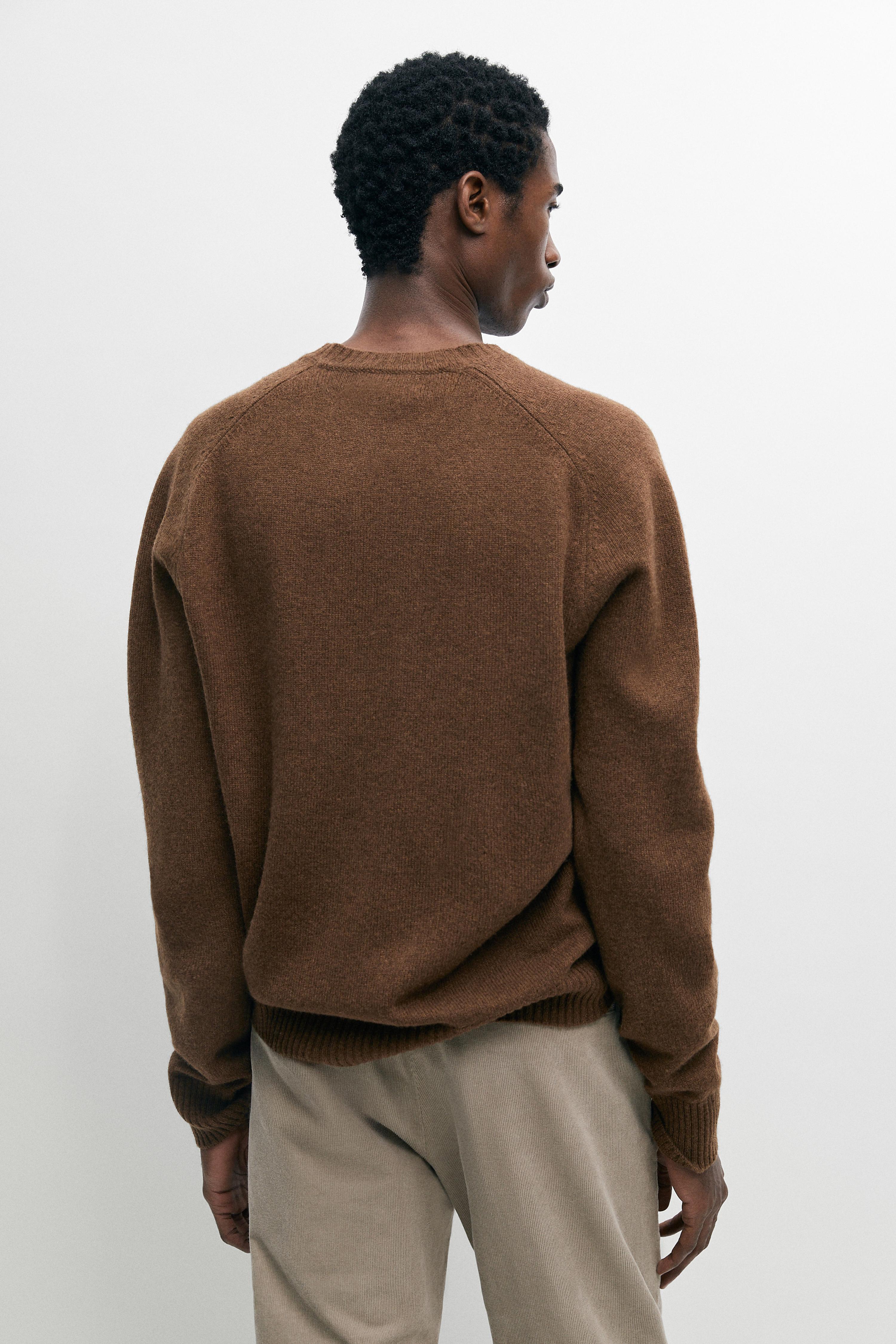 Wool-blend knit sweater with round neck