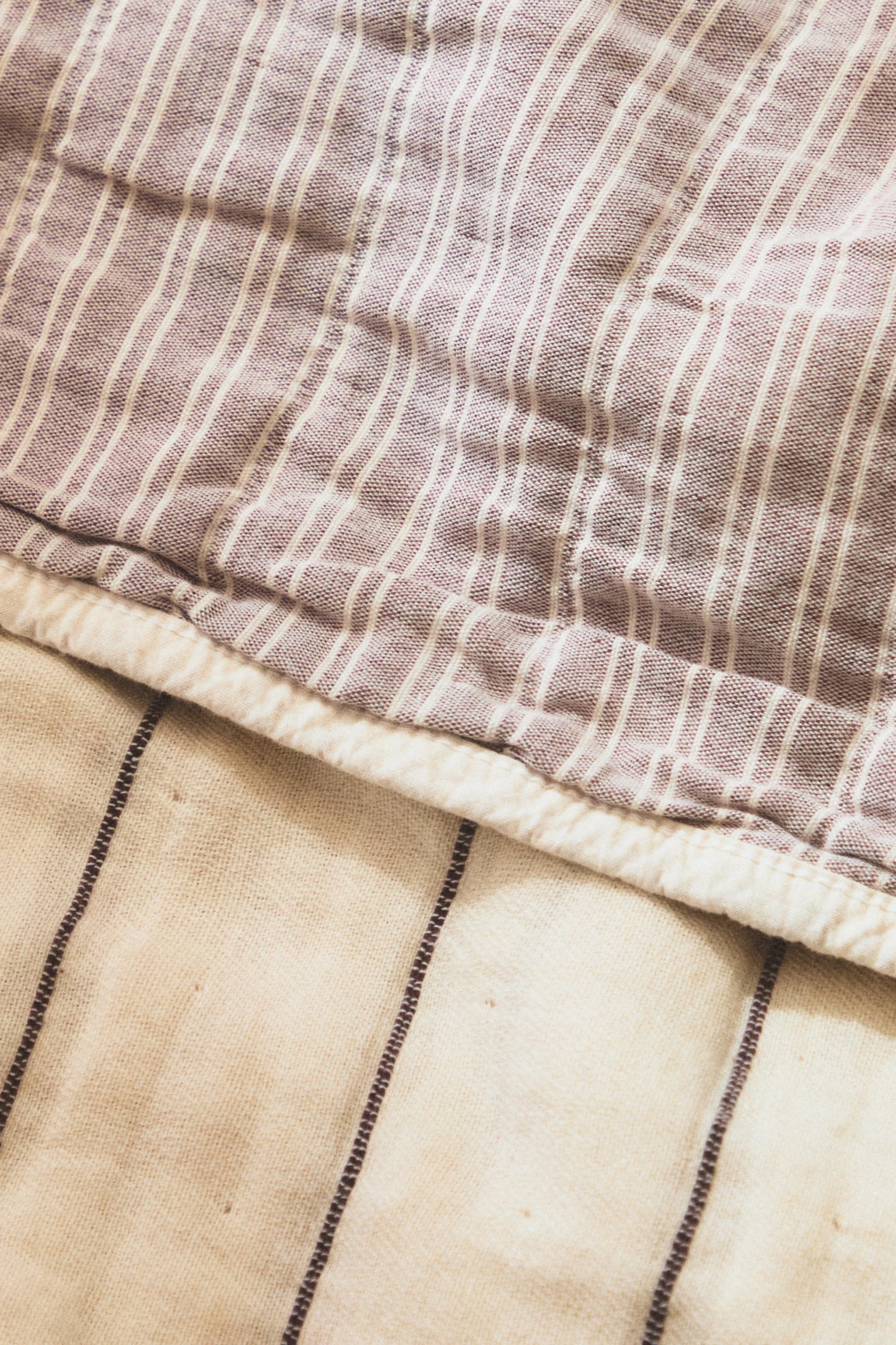 KIDS' REVERSIBLE CHECK AND STRIPE BEDSPREAD — Ecru