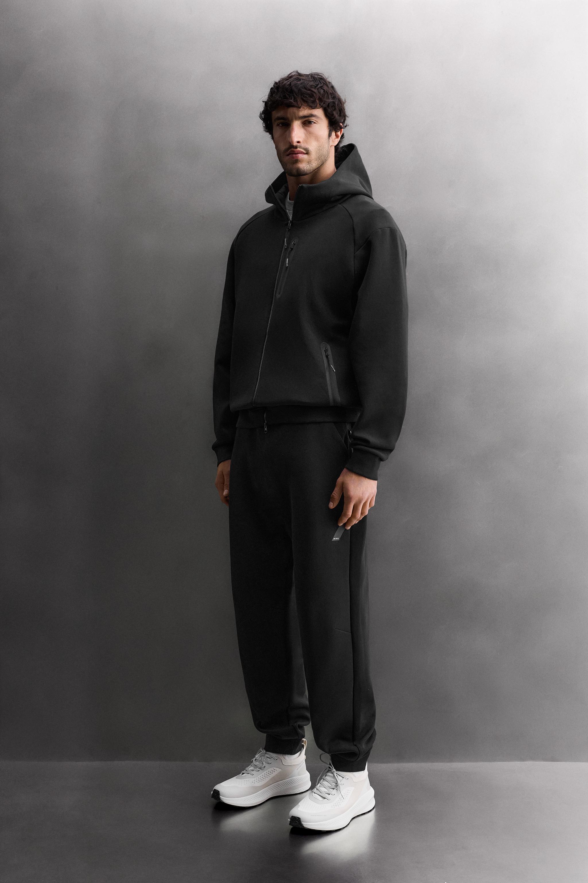 TECHNICAL ZIP HOODIE