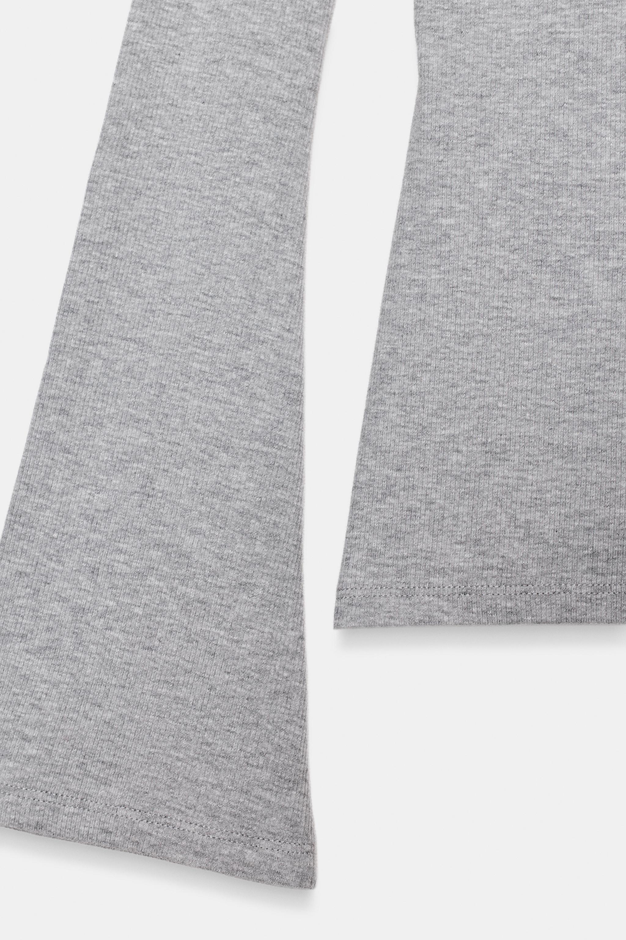 RIB TOP WITH FLARED SLEEVES