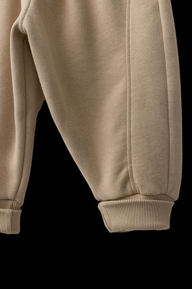 PANTALÓN JOGGER LOGO FLOCK - Tostado de Zara