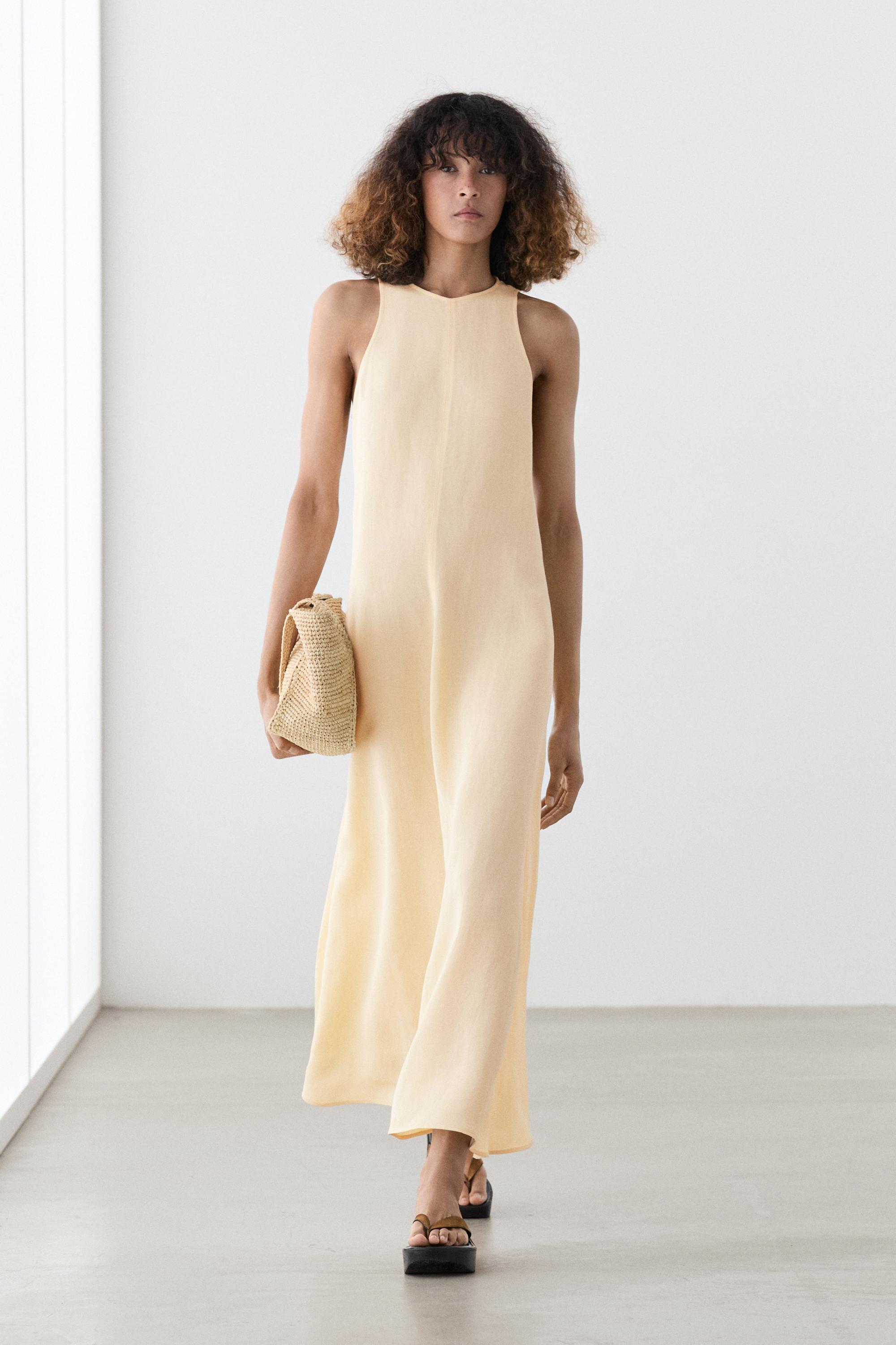 Flowing linen halter midi dress — Biscuit