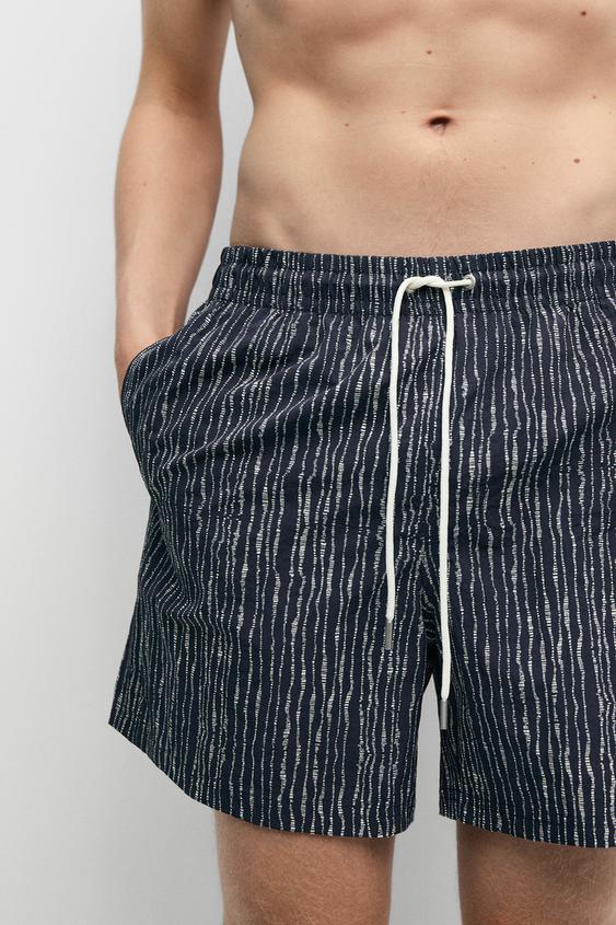 Printed swimming trunks from Zara - $90