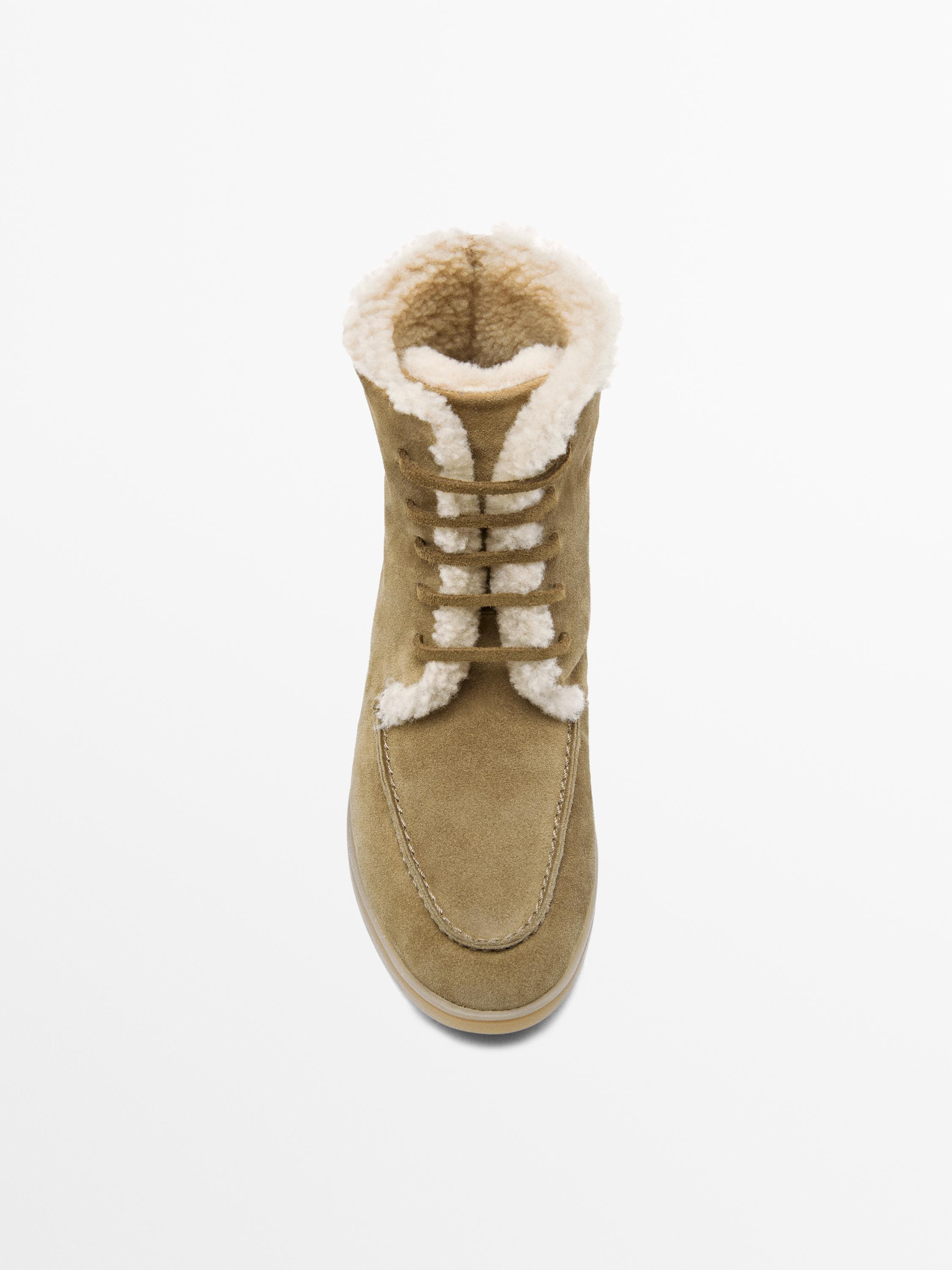Flat split leather ankle boots with lining