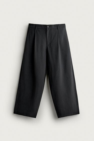 RELAXED FIT FLOWING PLEATED TROUSERS - Black by Zara