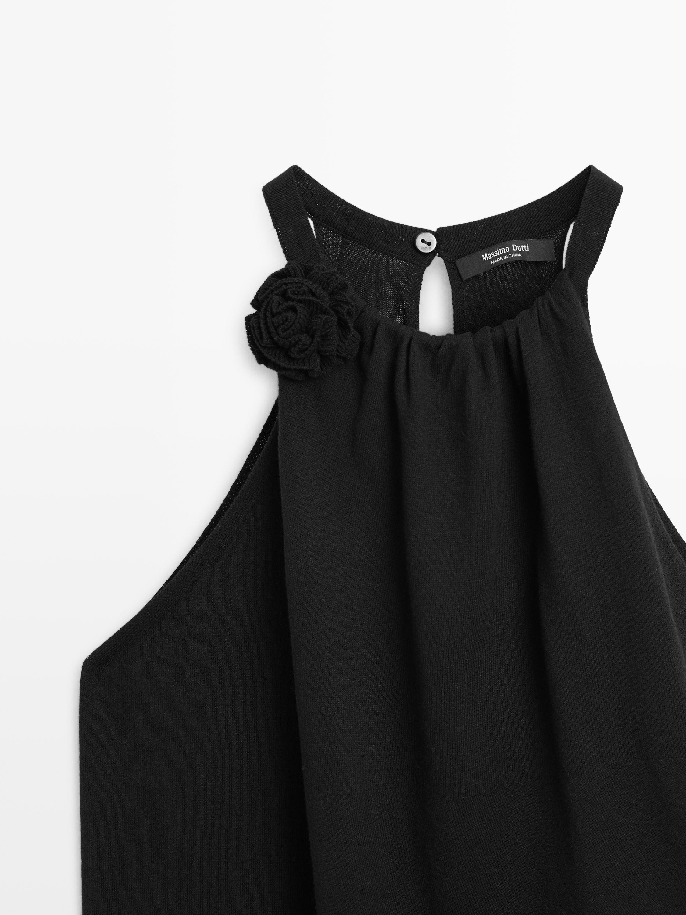 Top en maille de coton avec fleur