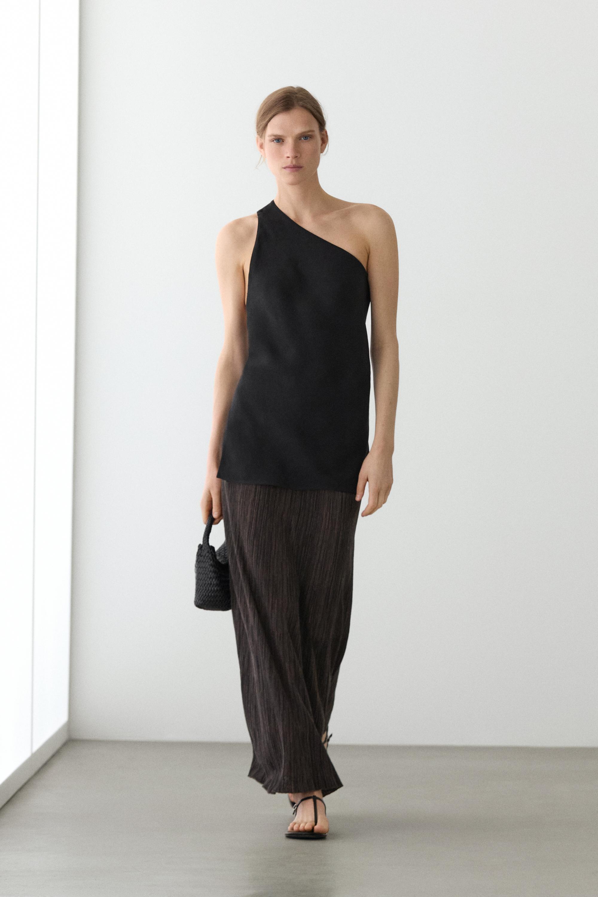 Total look pleated midi skirt with striped detail